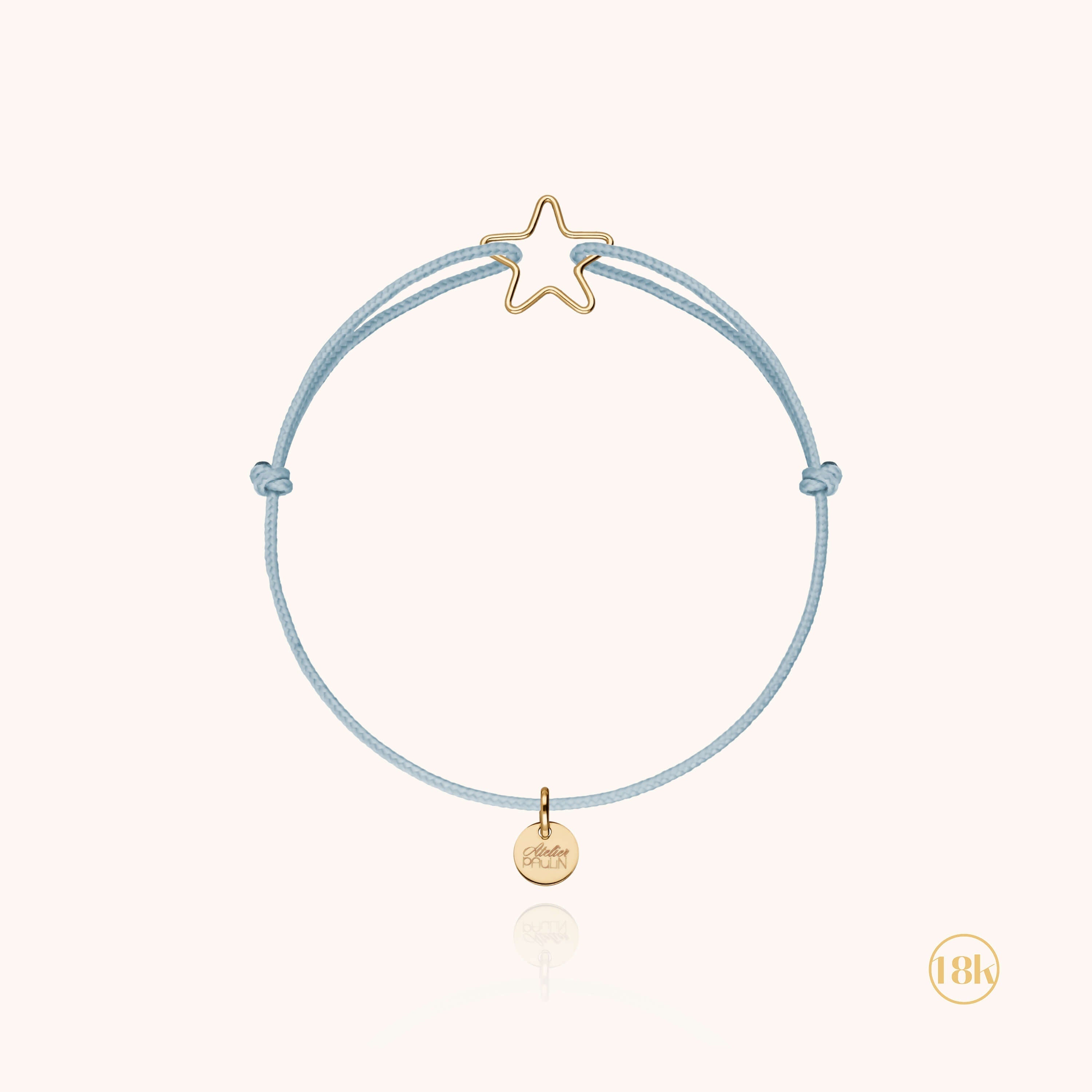 Bracelet cordon enfant petite étoile or jaune 750 sur fond blanc