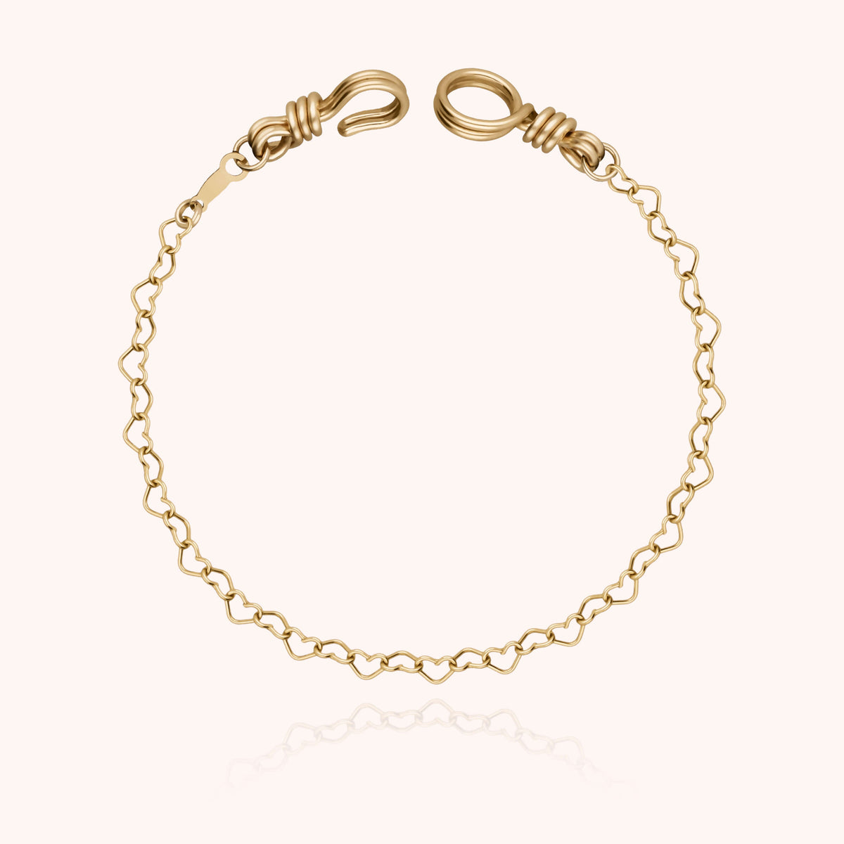 Kettenarmband Herz Attache moi — Detail des Metalldrahts