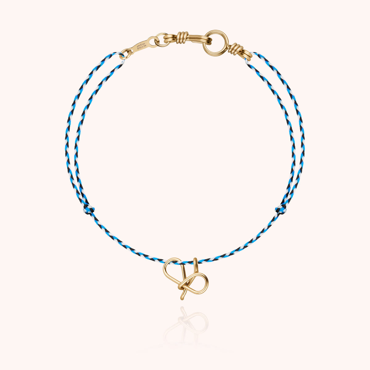 Mini Attache moi Initiale Slim Knot Cord Bracelet, worn on the wrist