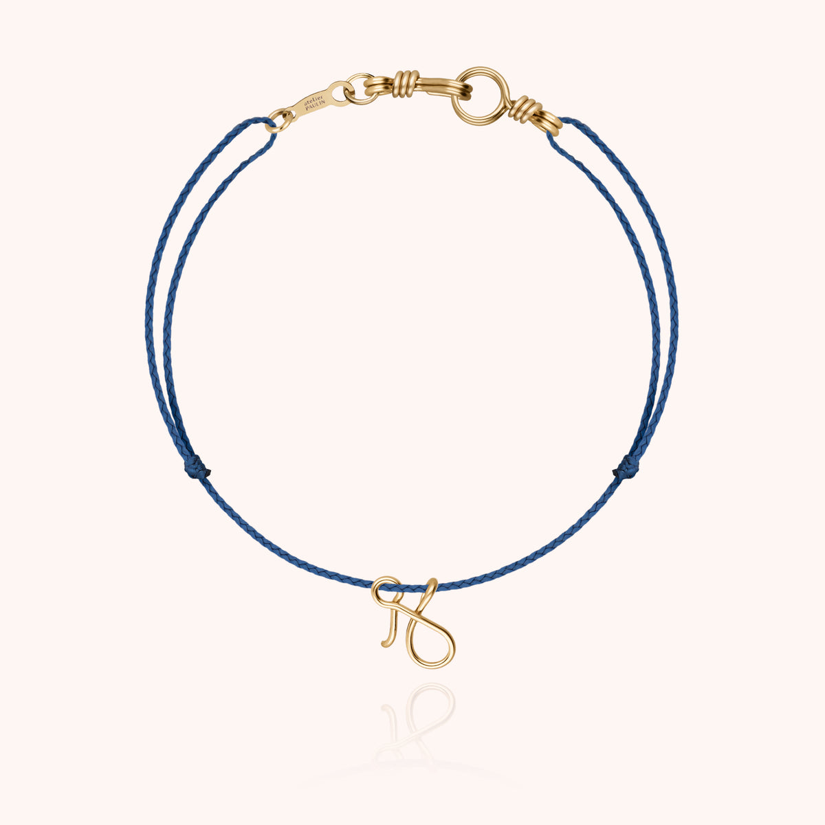 Armband Kordel Uni Initiale Mini Attache moi „J" aus 18 Karat Gelbgold, Kordel Mineralblau