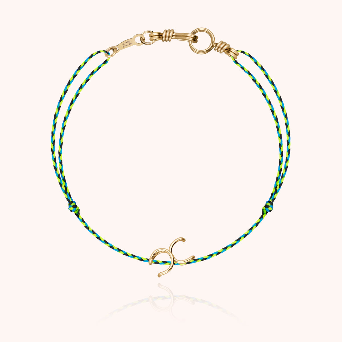 Mini Attache moi Initiale Slim Knot Cord Bracelet, worn on the wrist