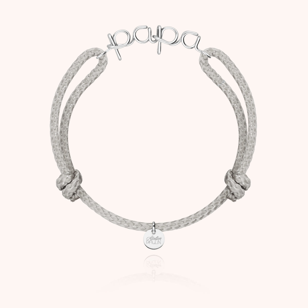 Detail of the hand-shaping on the Waxed Cord Bracelet Papa in sterling silver wire