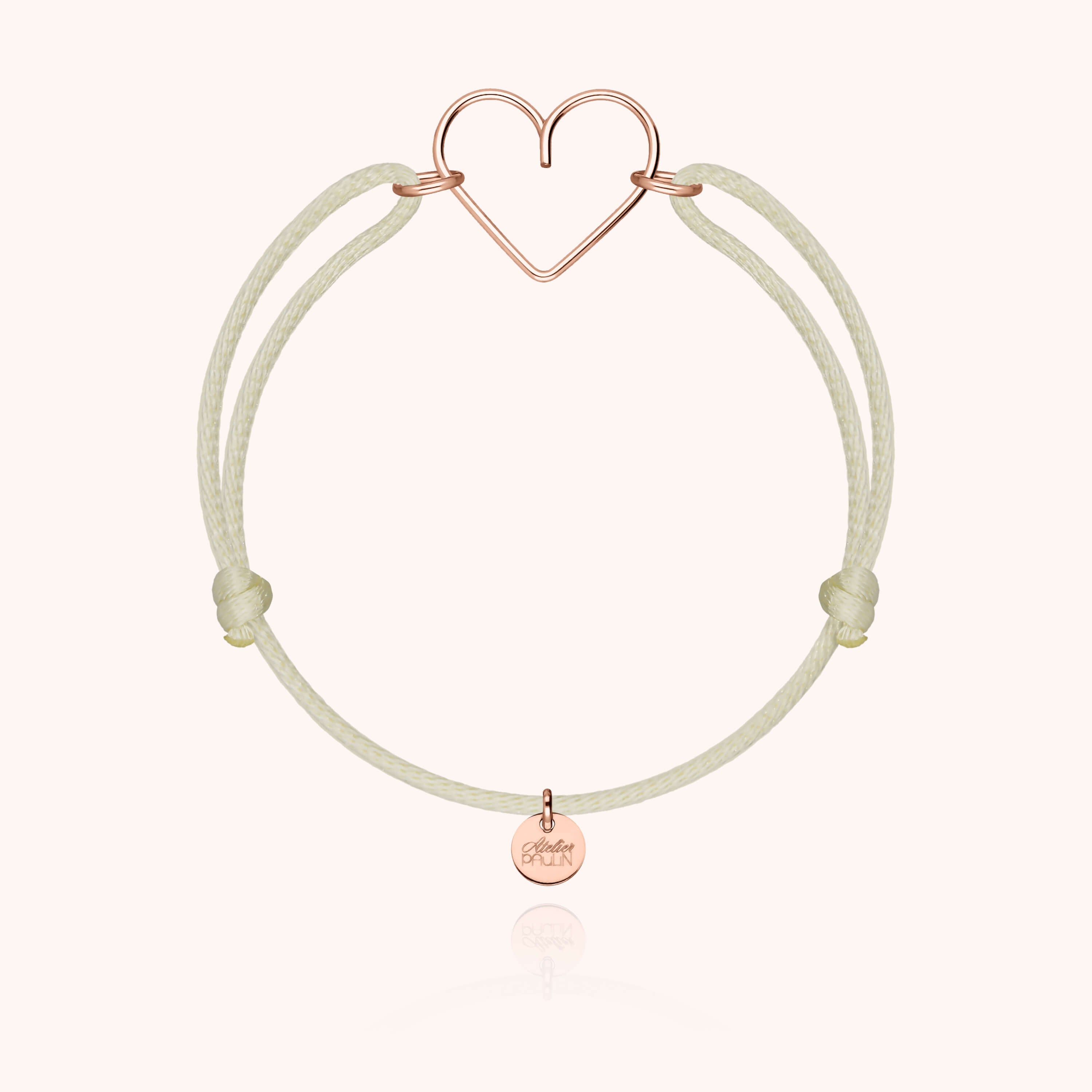 Bracelet cordon coeur or rose avec différentes couleurs de cordons