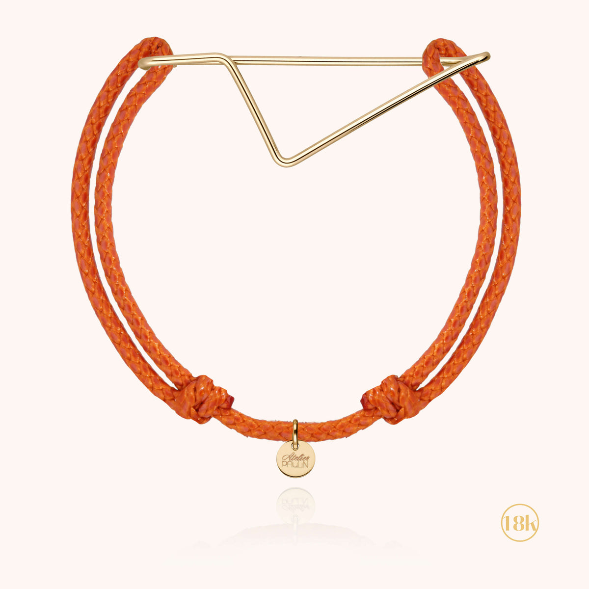 Dettaglio della modellatura a mano su Bracciale Cordino Corsica in filo d'oro giallo 18kt