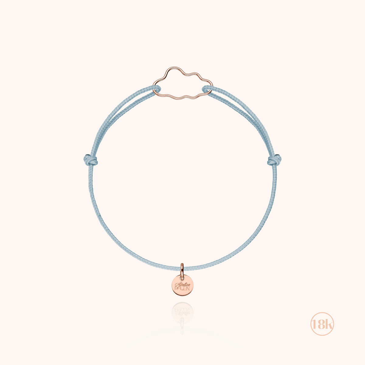 Bracciale Cordino Bambino Piccola Nuvola in filo d'oro rosa 18kt, portato al polso di un bambino