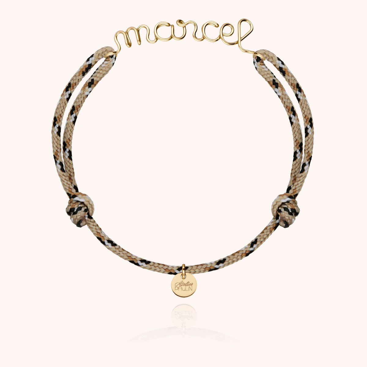 Personalized Cord Knot Bracelet for Men in 18k yellow gold wire, worn on the wrist