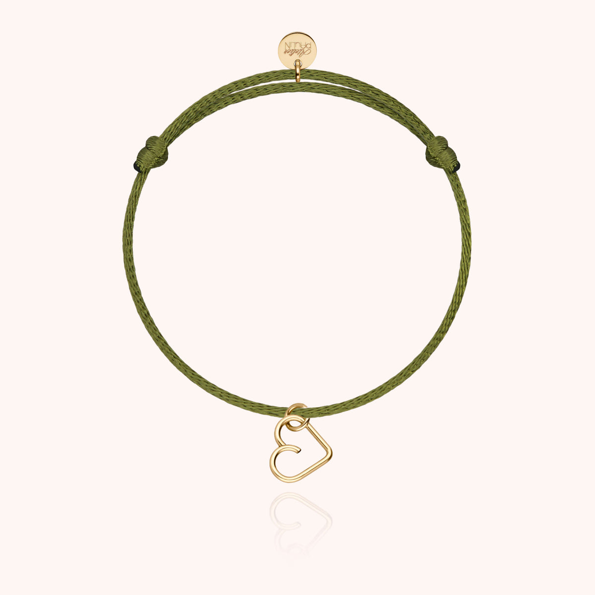 Modelli coordinati mamma e bambino, Bracciale Cordino Lucky Charms Cuore su fondo bianco