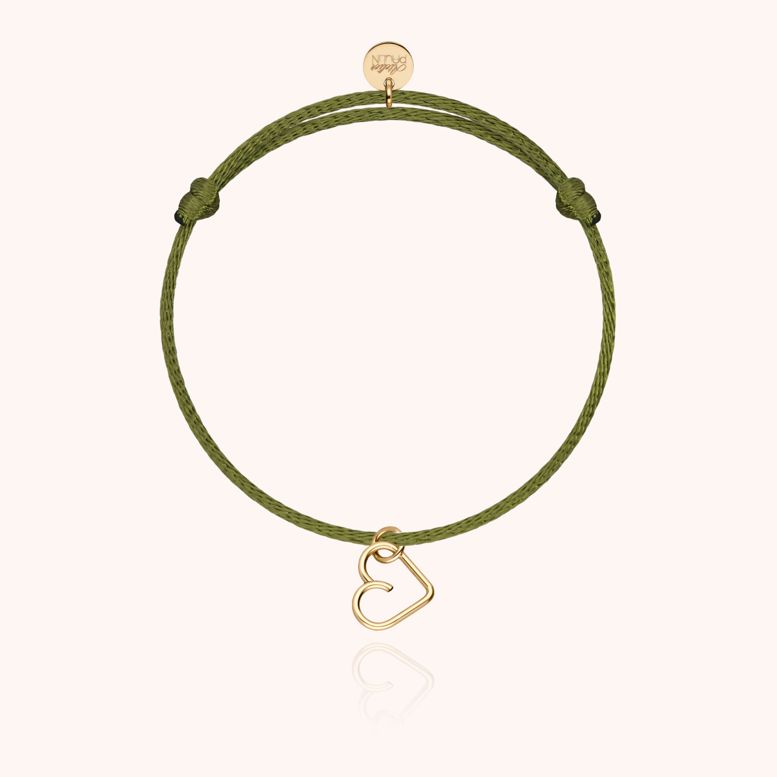 Bracelet maman-enfant cœur doré sur fond blanc élégant