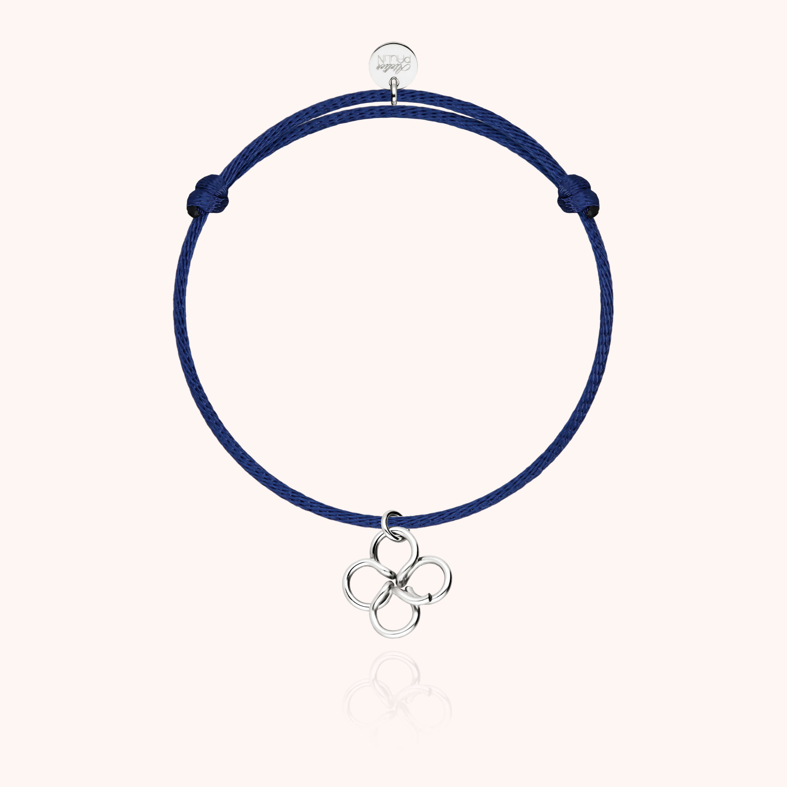 Vue d'ensemble du bracelet cordon trèfle or blanc, artisanat français parisien