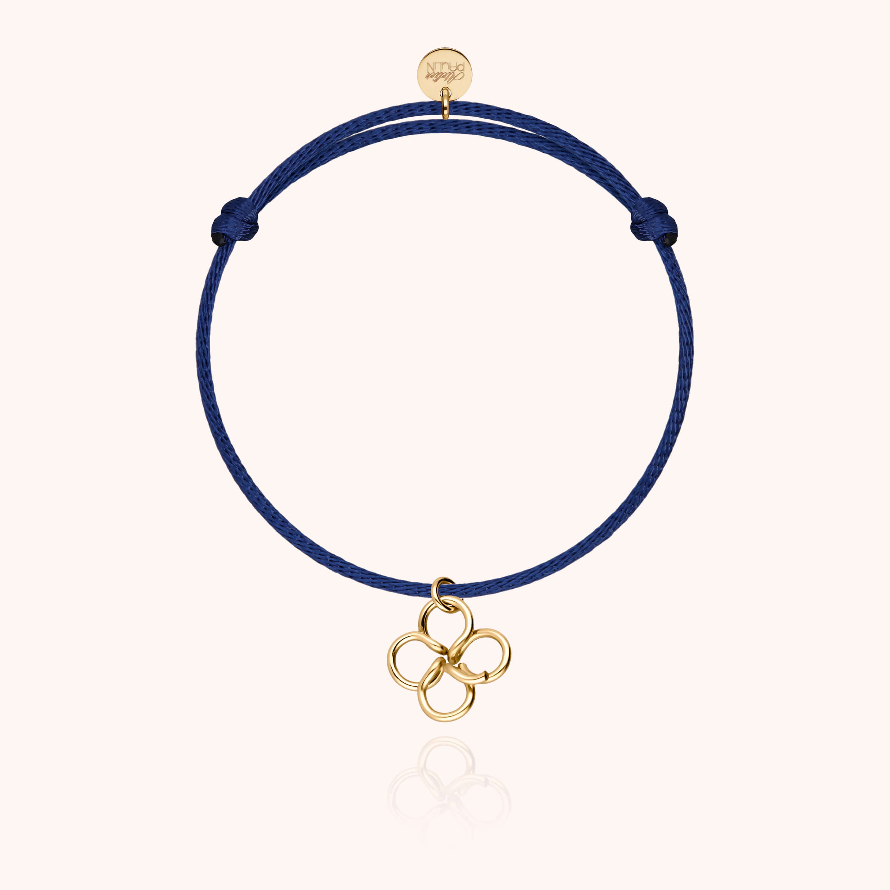 Bracelet Cordon Lucky Charms Trèfle porté au poignet — or jaune laminé livraison soigneuse garantie