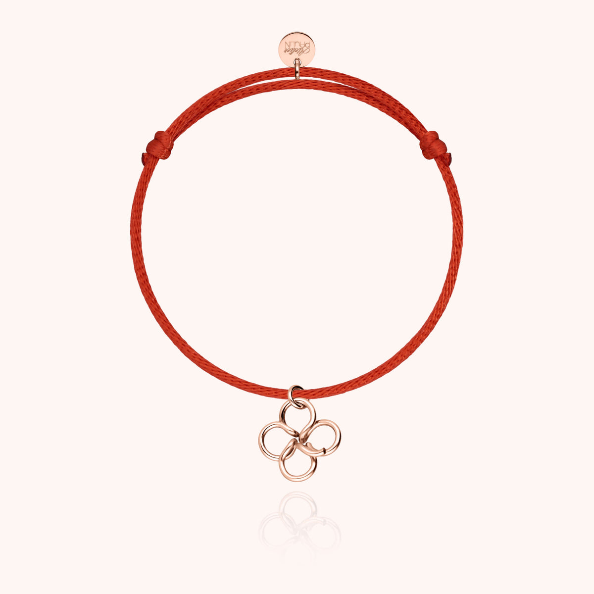 Lucky Charms Clover Cord Bracelet in 14k rose gold-filled wire, worn on the wrist