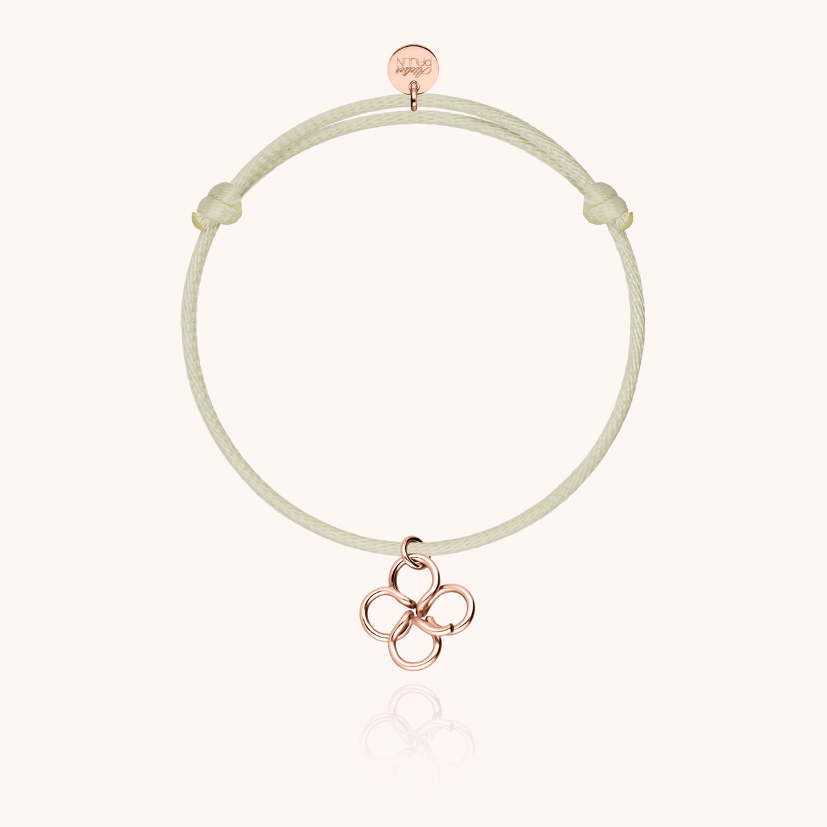 Close-up of the 14k rose gold-filled wire on the Lucky Charms Clover Cord Bracelet
