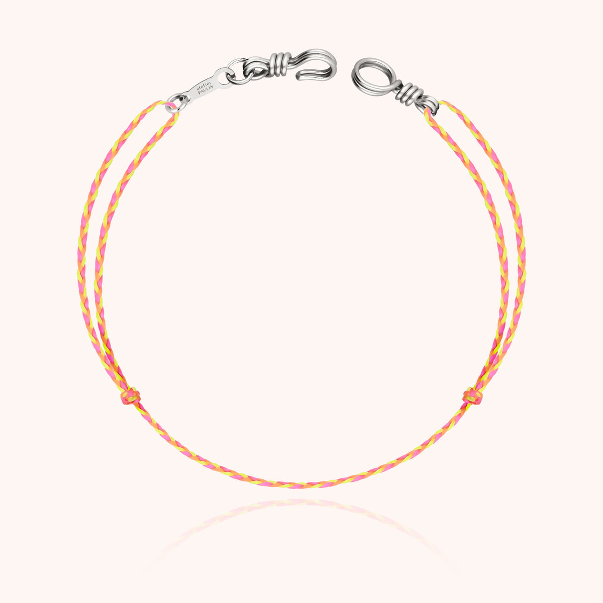 Unisex Cord Bracelet Mini Attache moi, worn on the wrist
