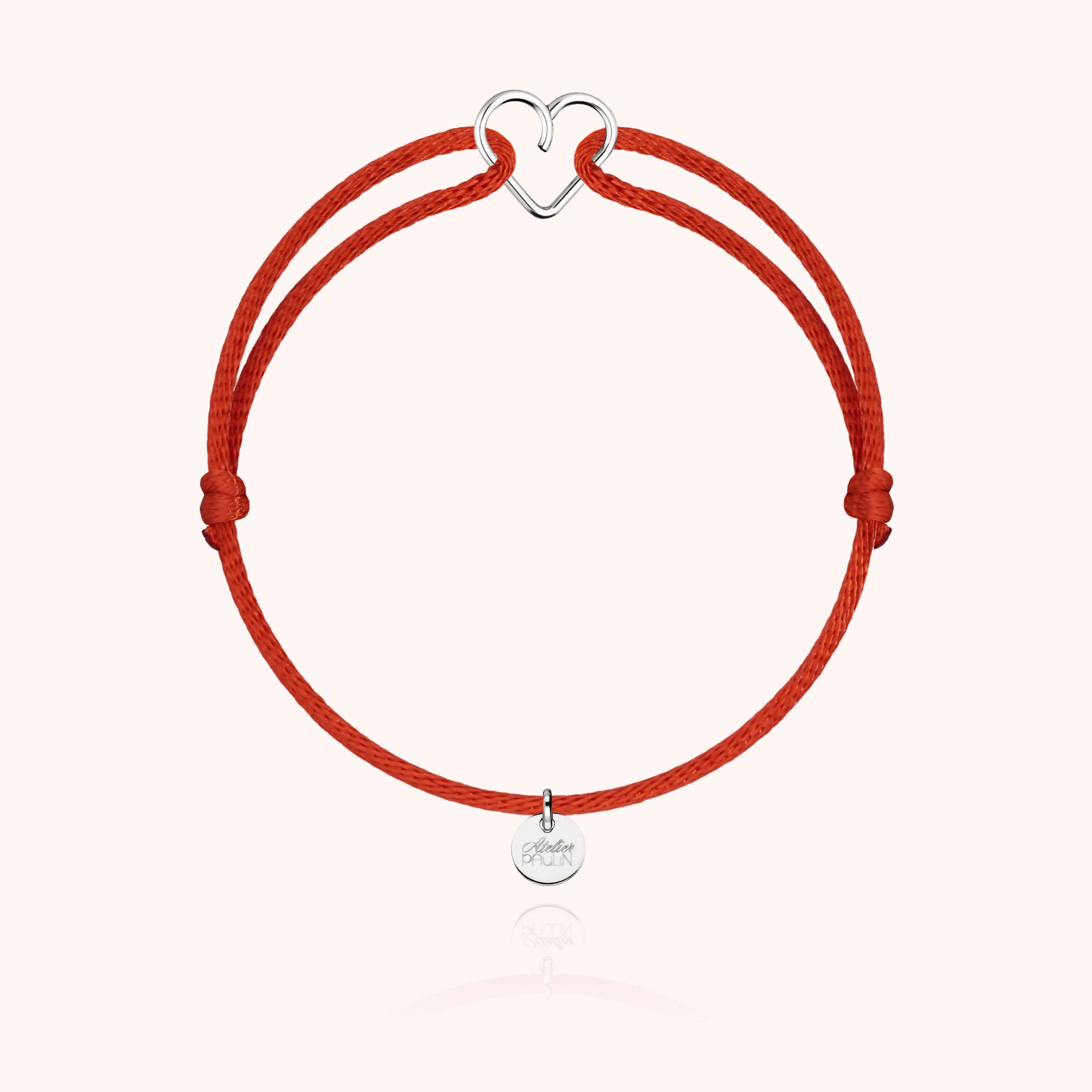 Packaging Atelier Paulin avec bracelet coeur argent et cordon