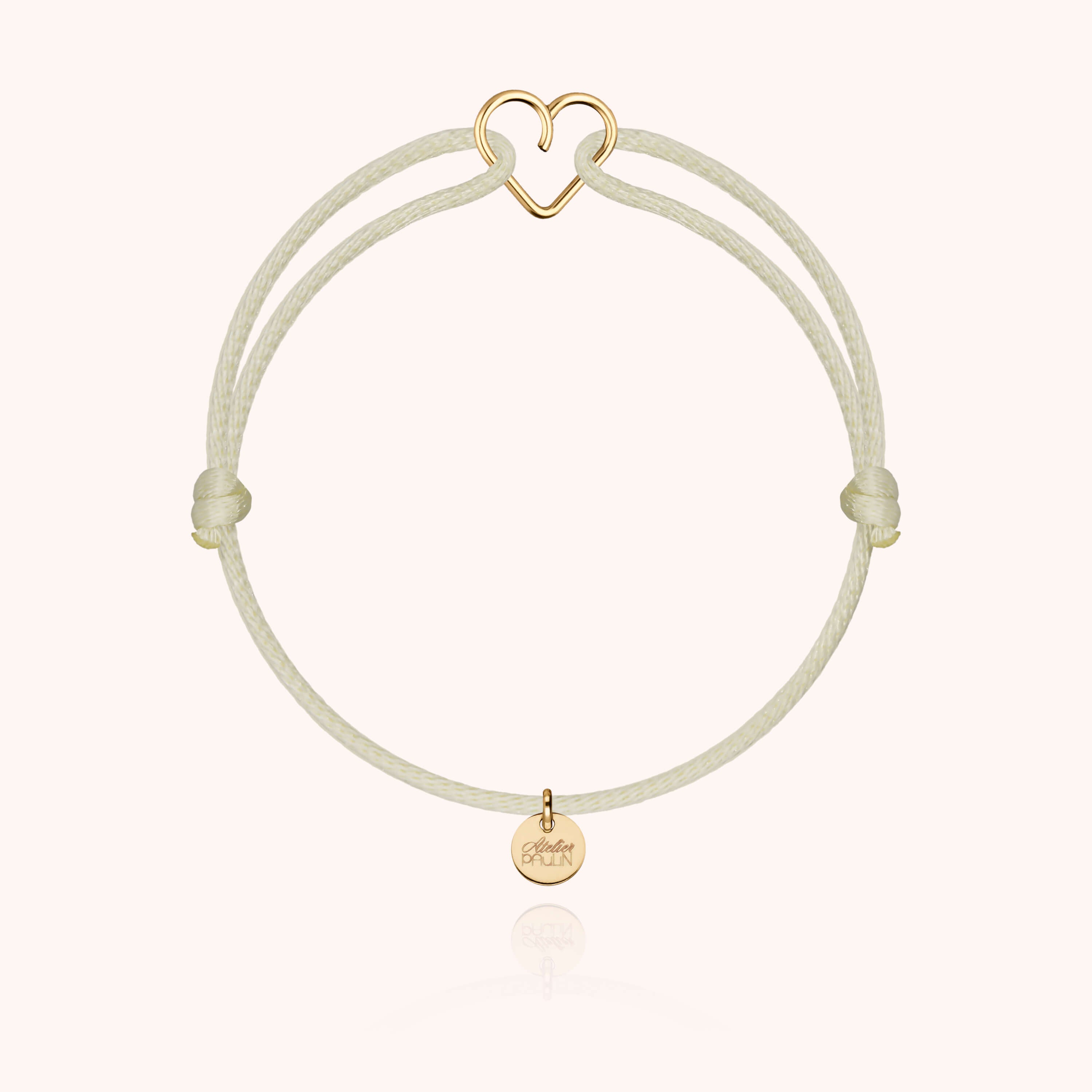 Détail façonnage prénom personnalisé bracelet cordon or façonnage main sans soudure - or jaune 750/1000