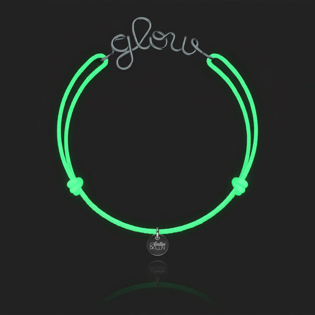Personalized Phosphorescent Cord Bracelet in sterling silver wire, worn on the wrist
