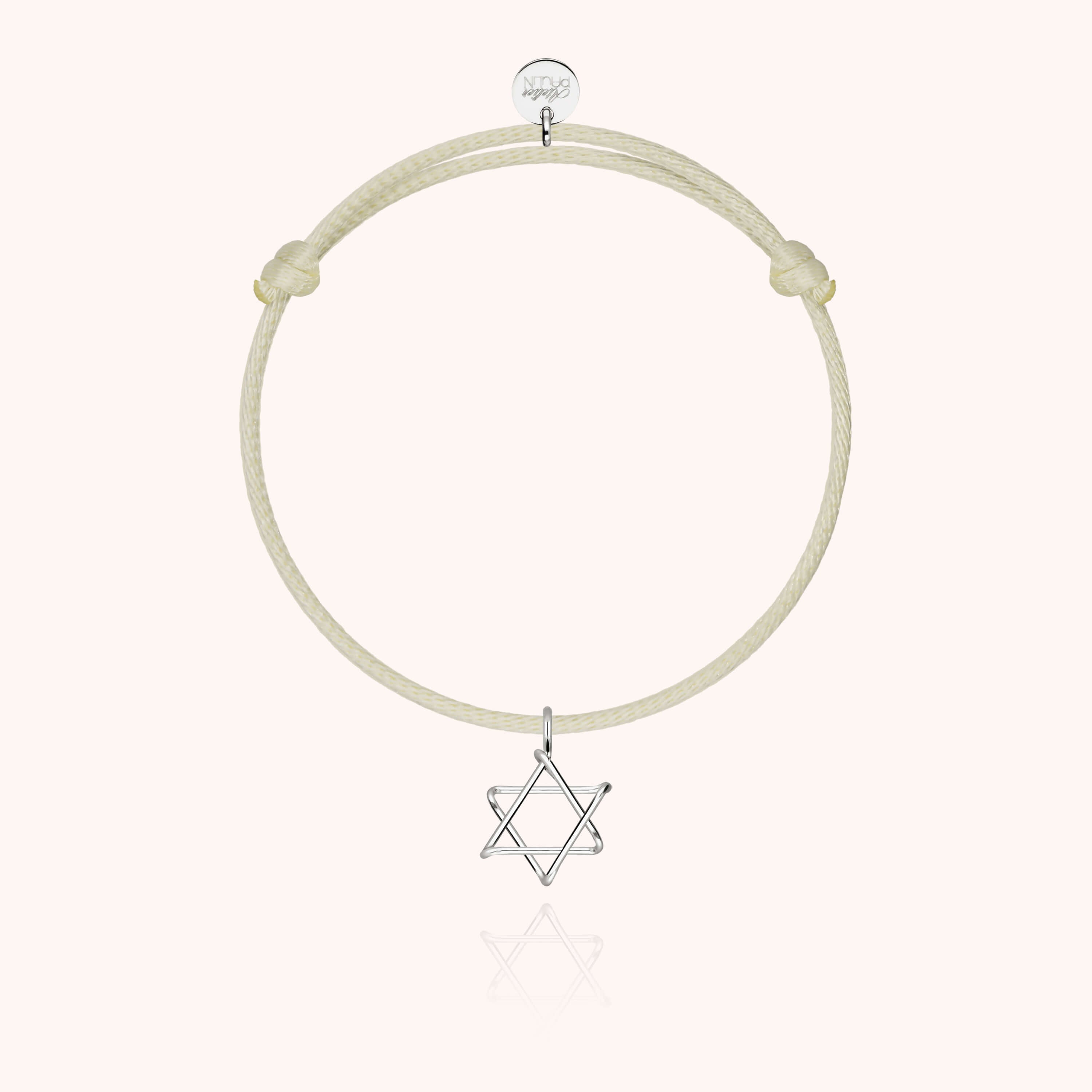 Bracelet cordon enfant avec pampille étoile de David portée au poignet