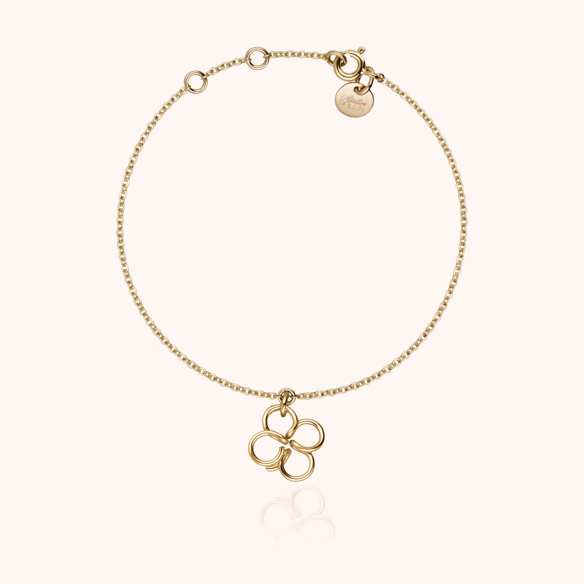 Braccialetto Lucky One Charms Trèfle in filo d'oro giallo laminato 14k, portato al polso