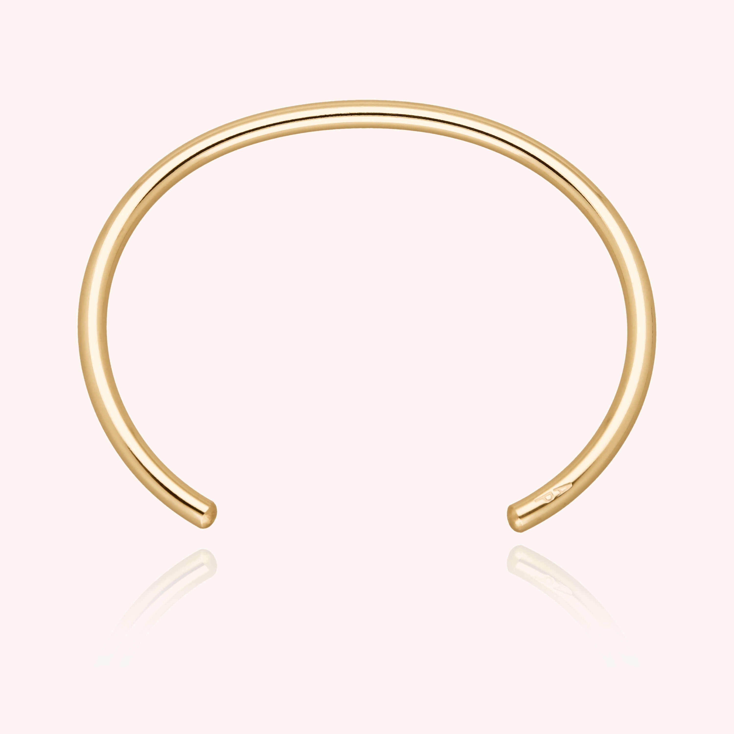 Bracelet O Cube — détail du fil métallique, or jaune laminé