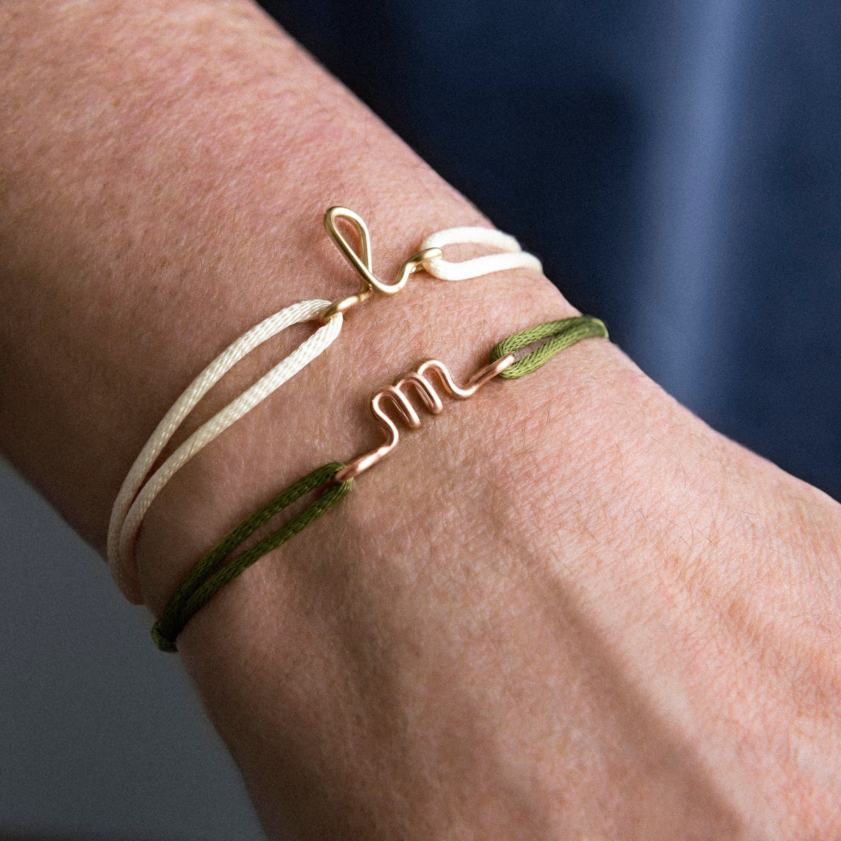 Original Initiale Cord Bracelet in 14k rose gold-filled wire, worn on the wrist