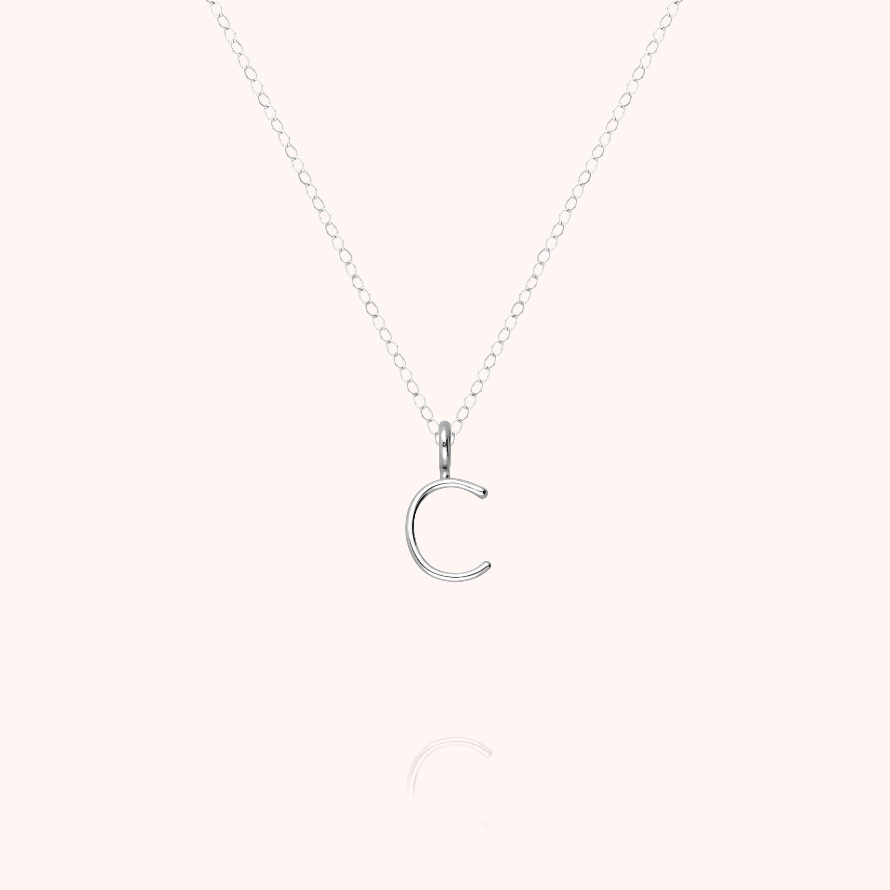 Collana Maiuscola Iniziale - oro bianco 18kt.
