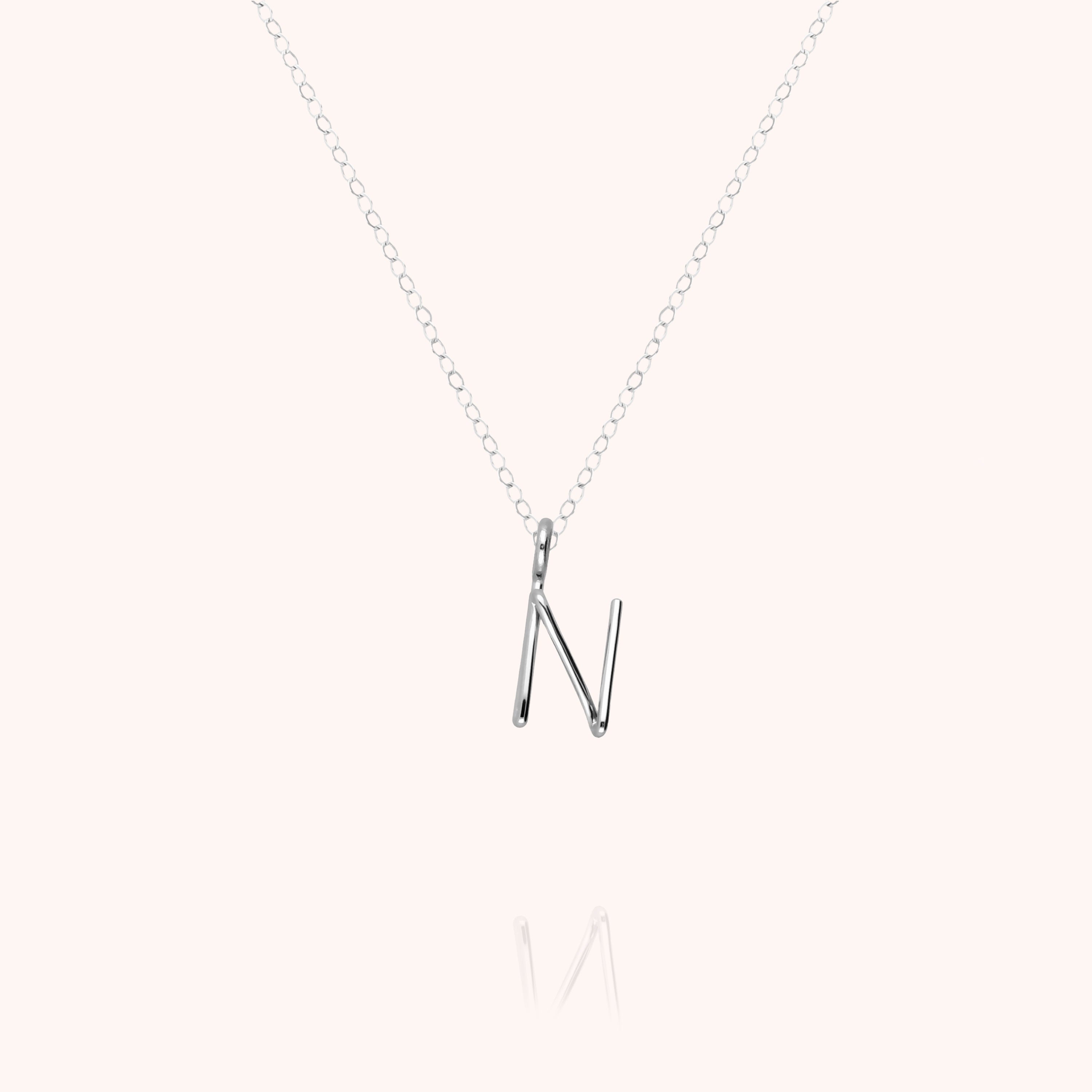Collier Capital Initiale en or blanc 18K — expédition sécurisée Paris