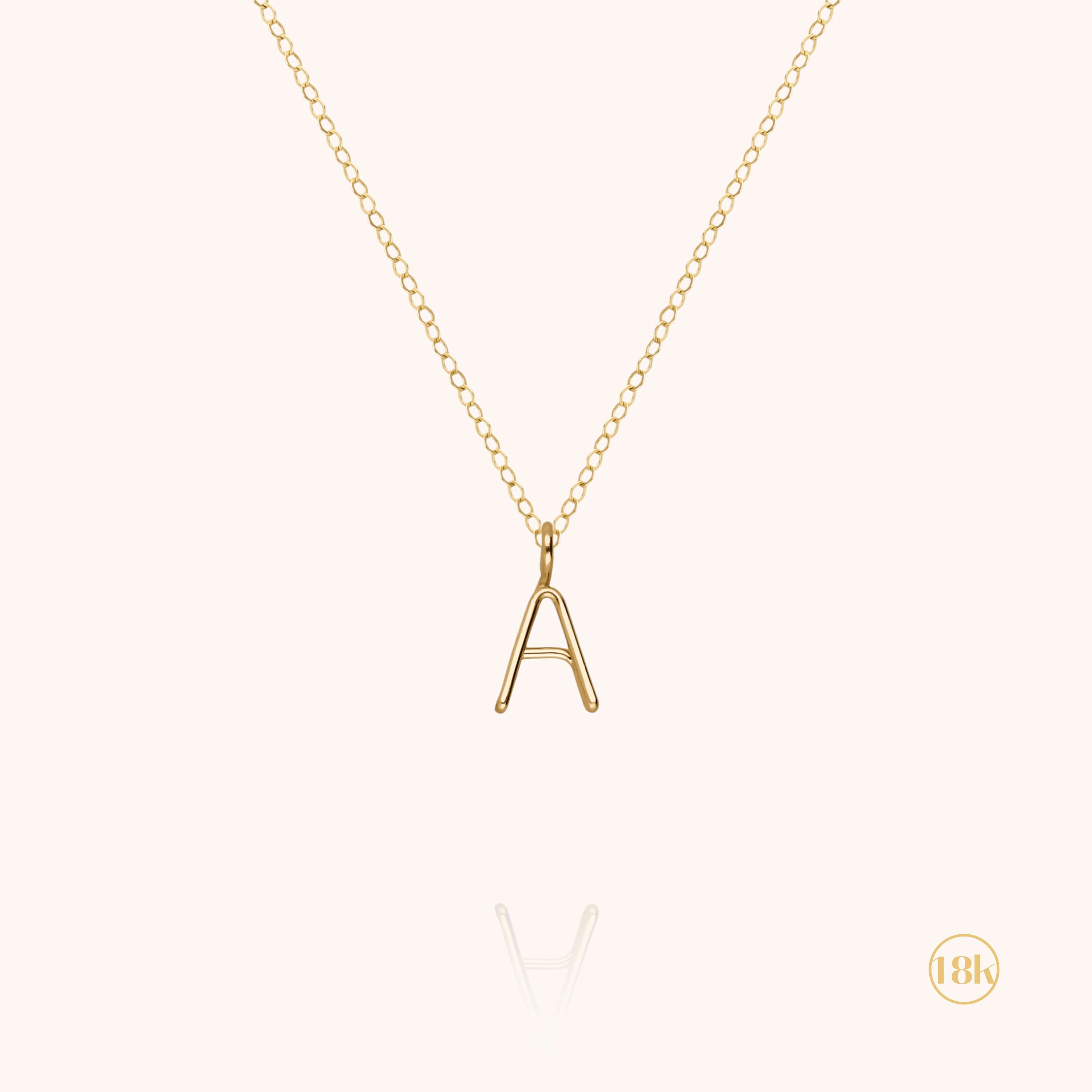 Collier Capital Initiale en or jaune 18K — fabriqué à la main à Paris