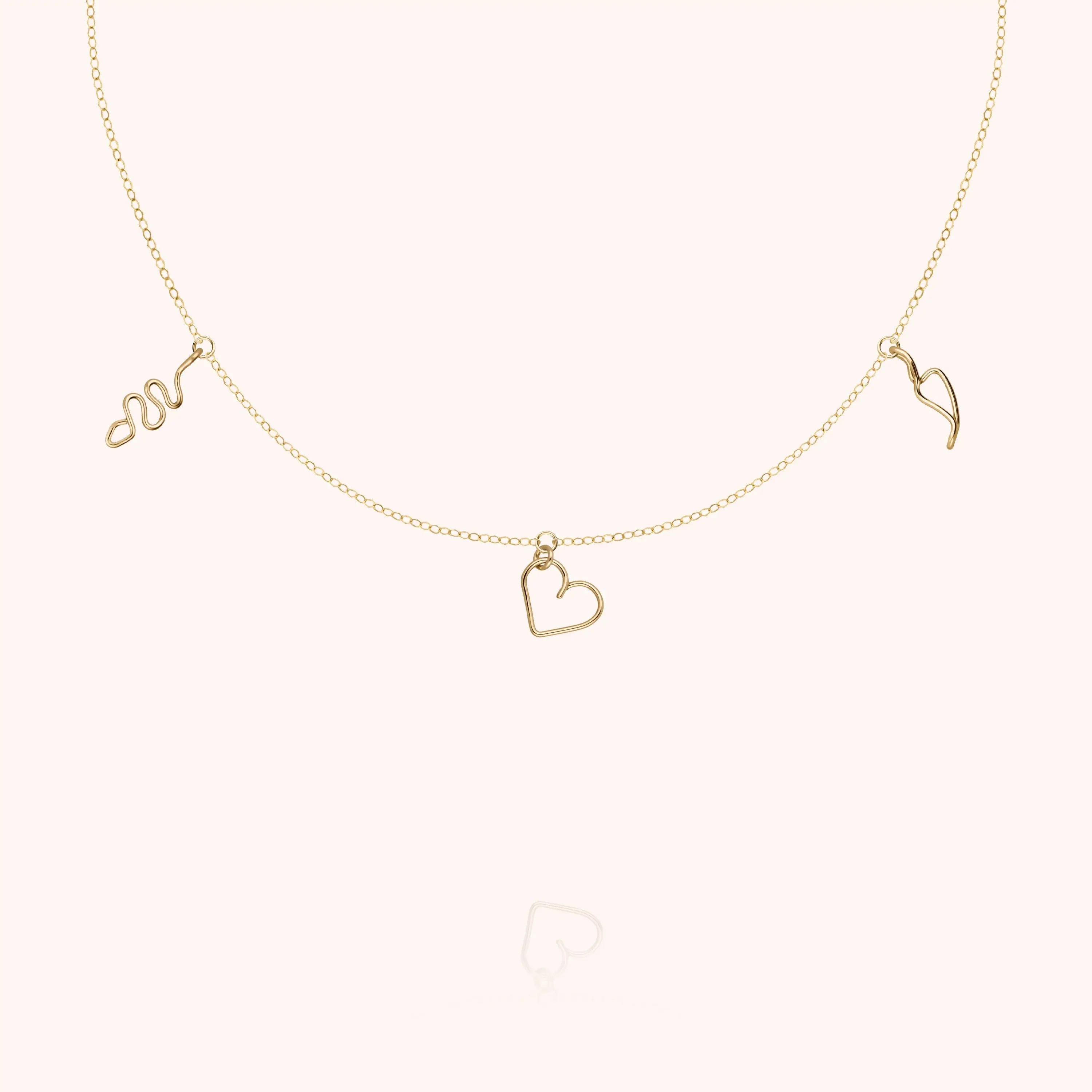 Collier Charms Dare to Love Me — fabriqué à la main à Paris
