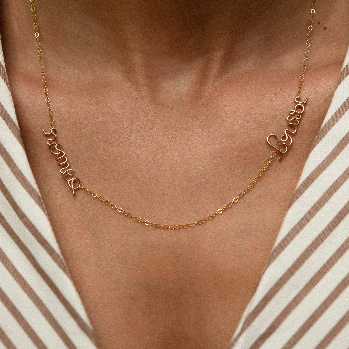 Detail of the hand-shaping on the letters in 14k gold-filled wire