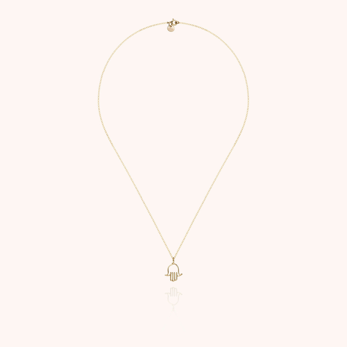 Collana Charms Simbolico Mano di Fatma in filo d'oro giallo laminato 14k, portata al collo