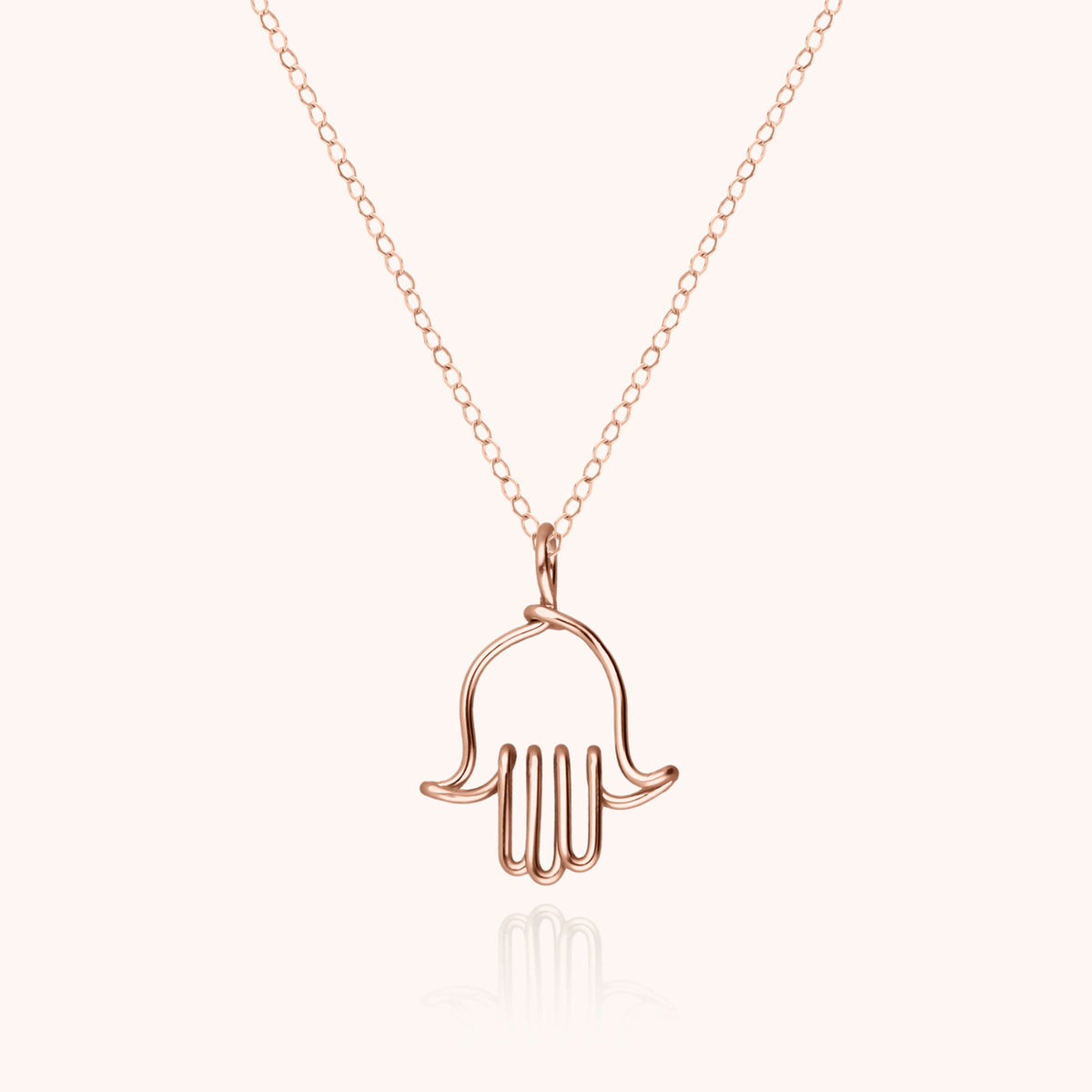 Collier Main de Fatma charm or rose laminé pour enfant vue face