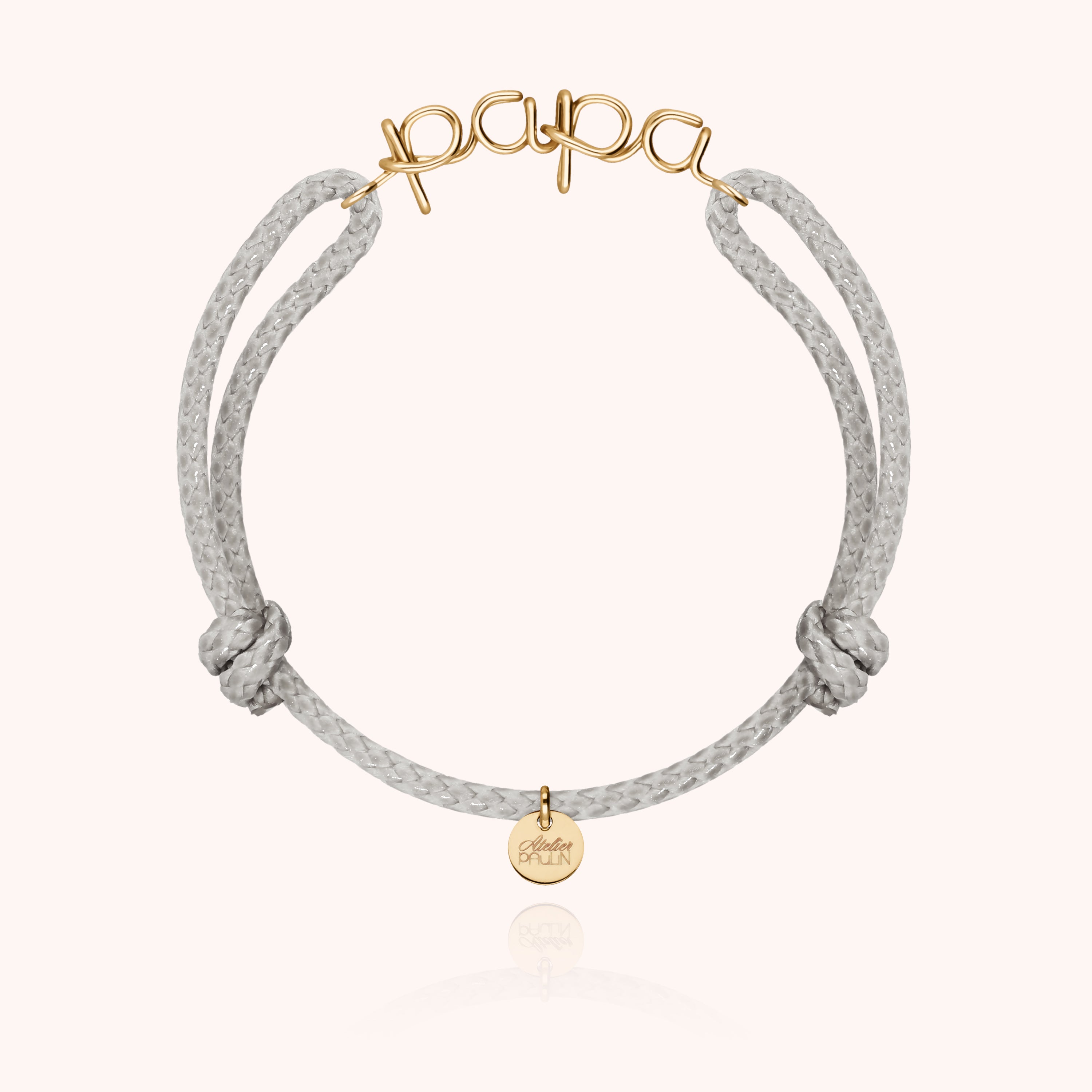 Vue d'ensemble du bracelet papa avec cordon ciré et fil d'or précieux
