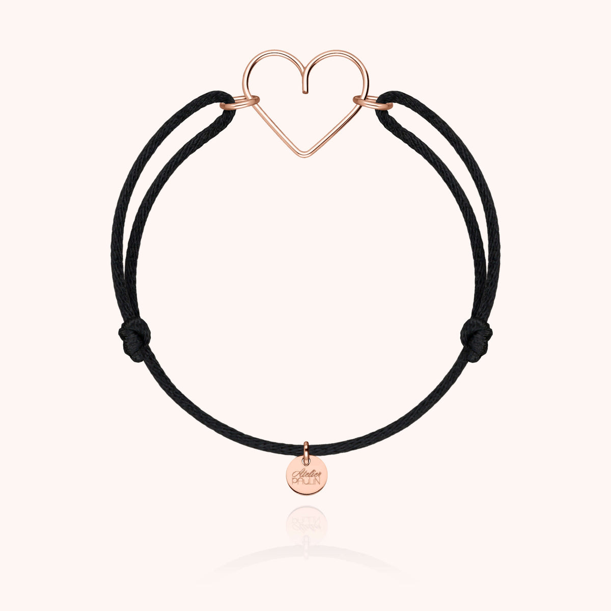 Dettaglio del pendente cuore in filo d'oro rosa laminato 14k