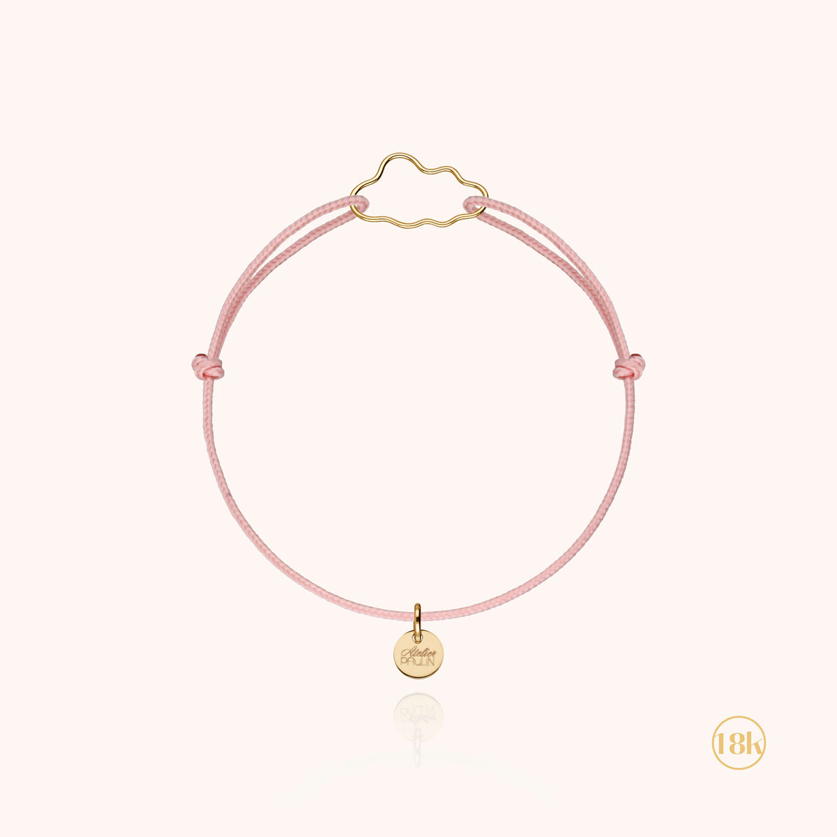 Bracciale Cordino Bambino Piccola Nuvola in filo d'oro giallo 18kt, portato al polso