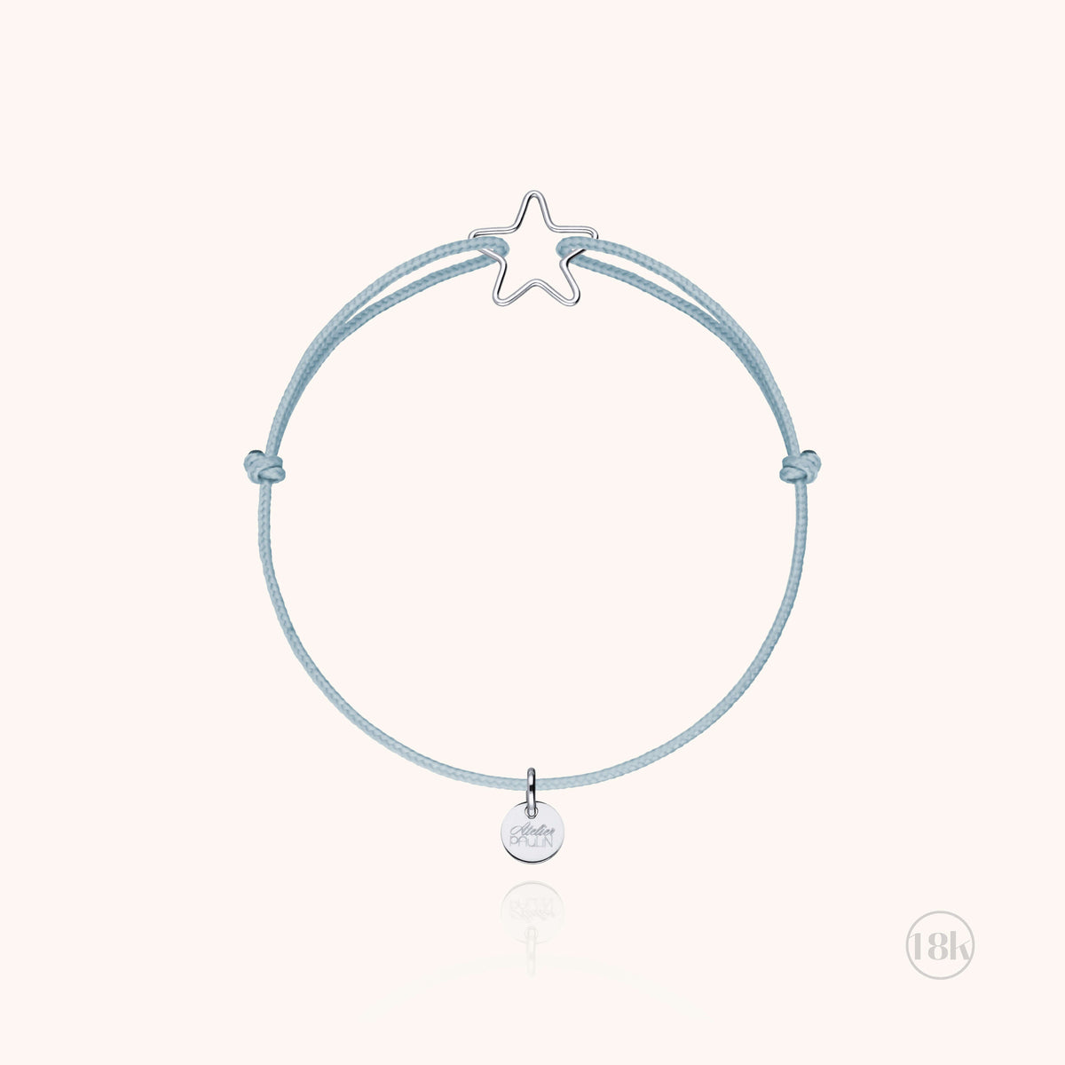 Bracciale Cordino Bambino Piccola Stella con la sua stella in oro, portato al polso di un bambino