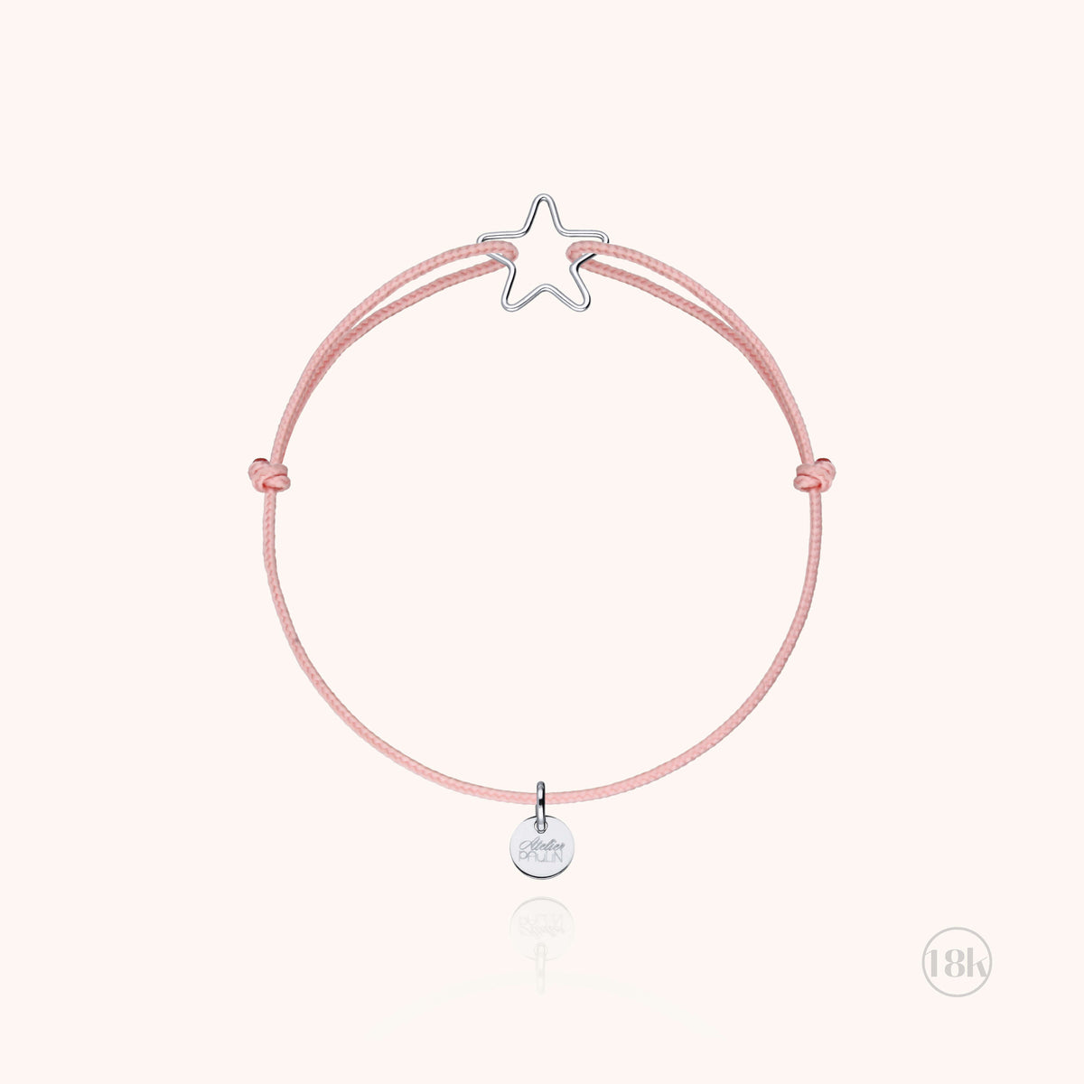 Bracciale Cordino Bambino Piccola Stella in filo d'oro bianco 18kt, su fondo bianco
