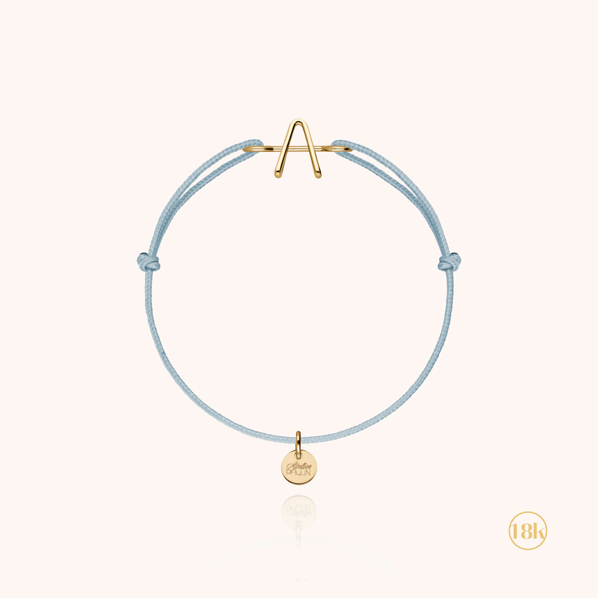Kinderarmband Kordel Initiale aus 18K Gelbgold — von Hand gefertigtes Schmuckstück Atelier Paulin