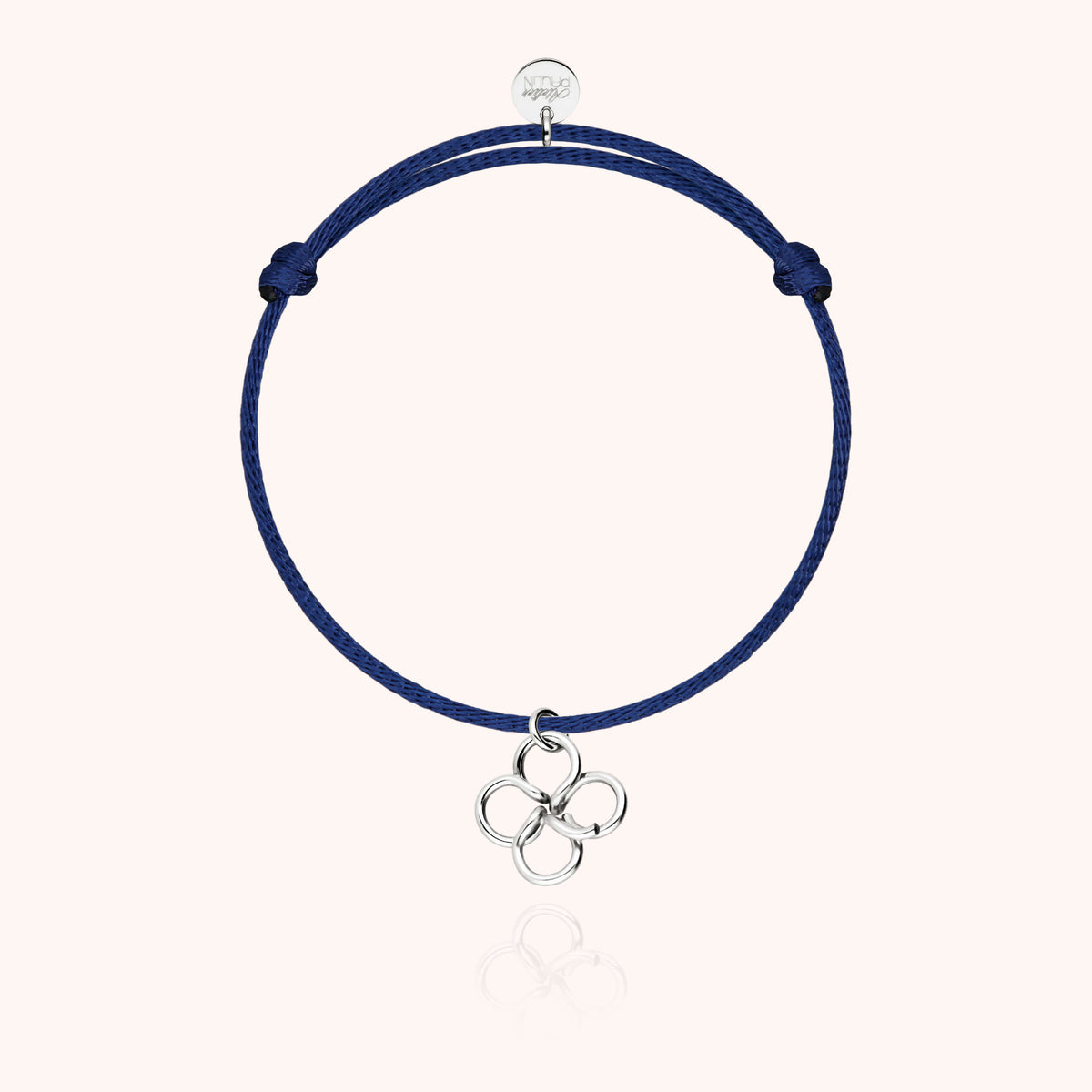 Bracciale Cordino Lucky Charms Trifoglio in filo d'argento sterling 925 con il suo charm quadrifoglio, portato al polso