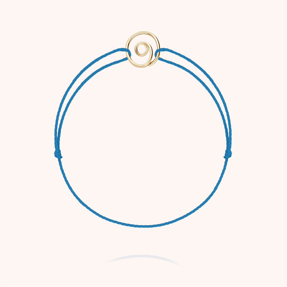 Eye of Saint Lucia Blue Cord Bracelet in 14k yellow gold-filled wire, sky blue cord