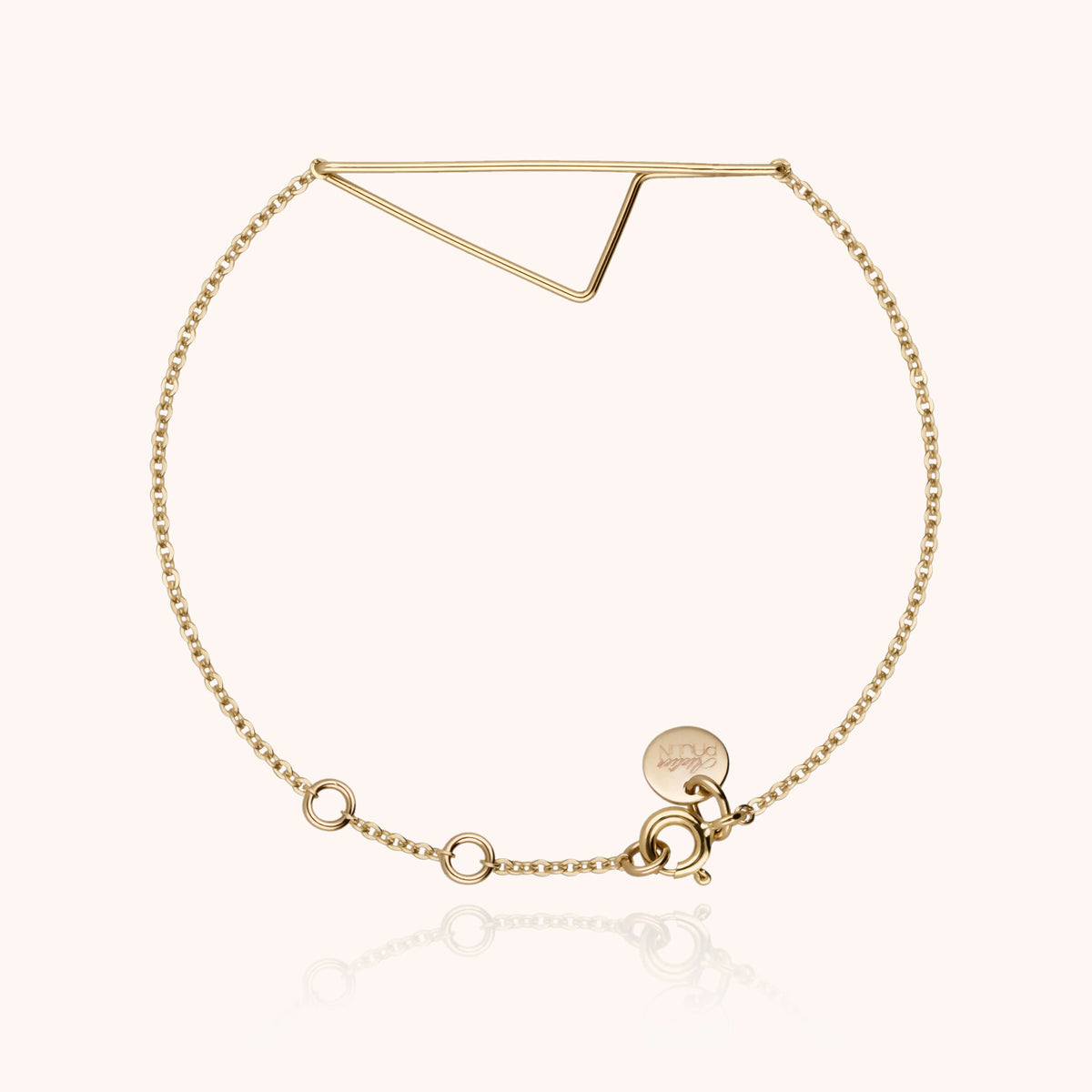 Bracciale Corsica in filo d'oro giallo laminato 14k, portato al polso