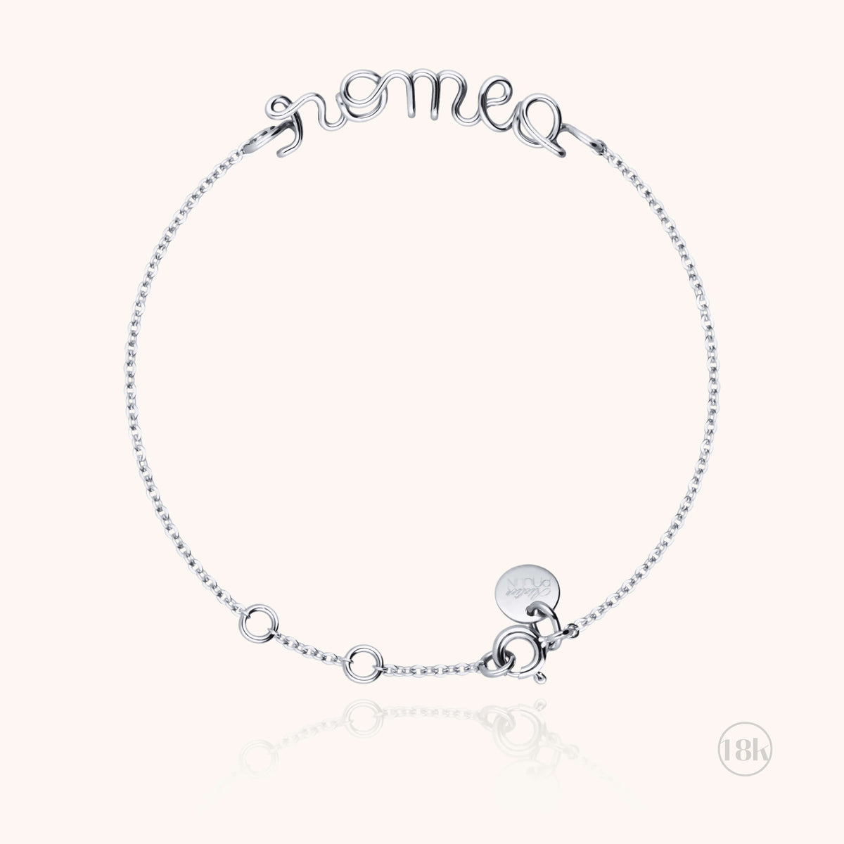 Personalized Richelieu Bracelet in 18k white gold wire, worn on the wrist