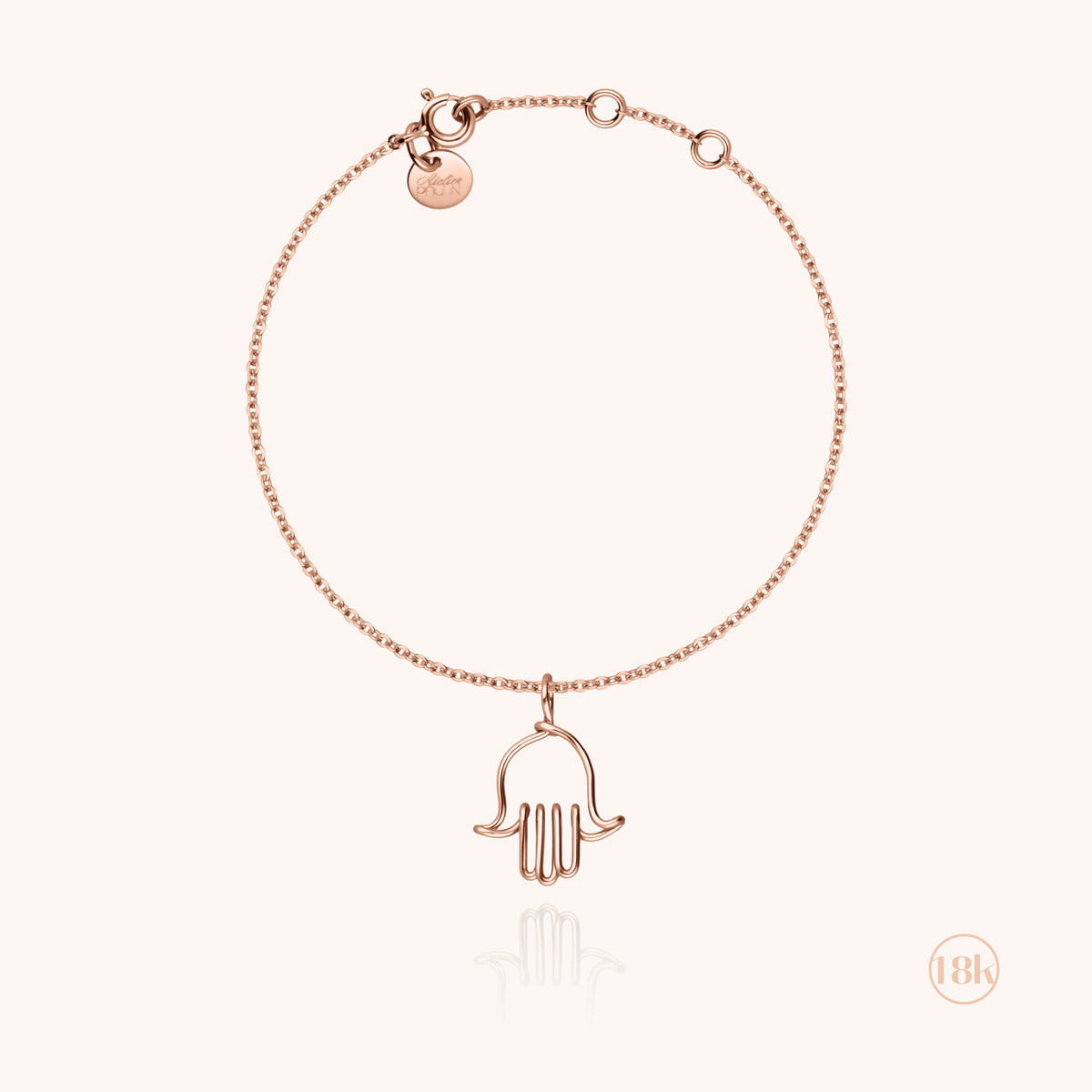 Detail des Hand-der-Fatima-Charms in Roségoldfilled am Kordelarmband Richelieu