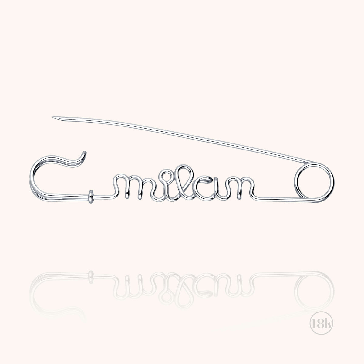 Close-up of the 18k white gold wire on the Personalized Safety Pin Brooch