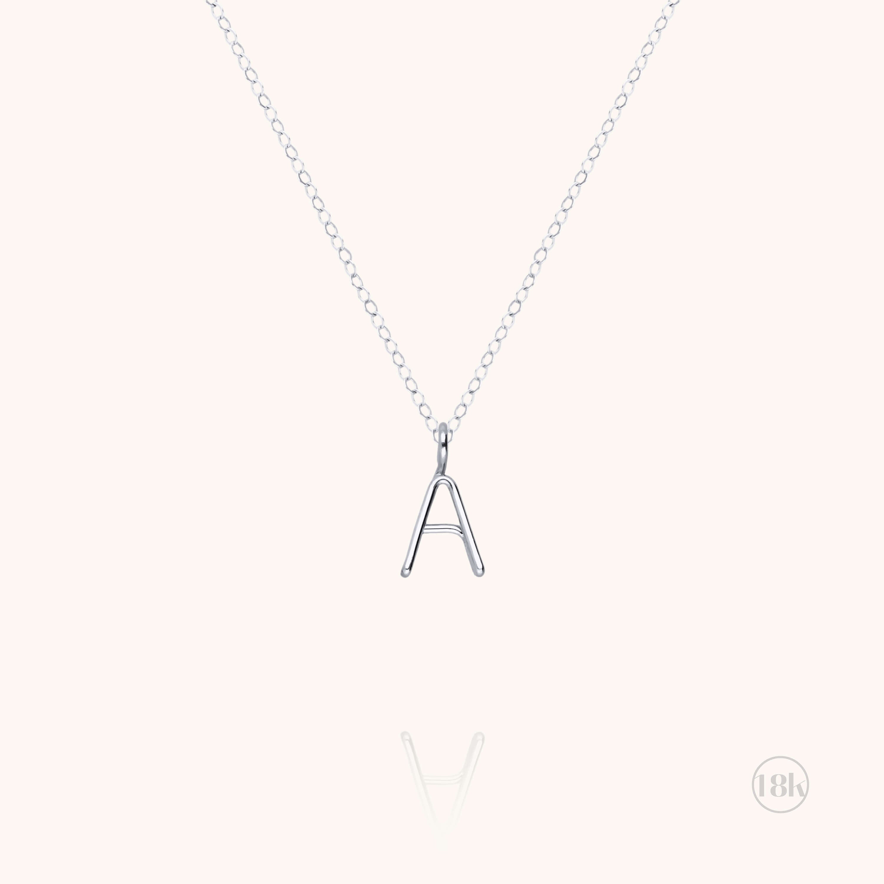 Collana Maiuscola Iniziale - oro bianco 18kt.
