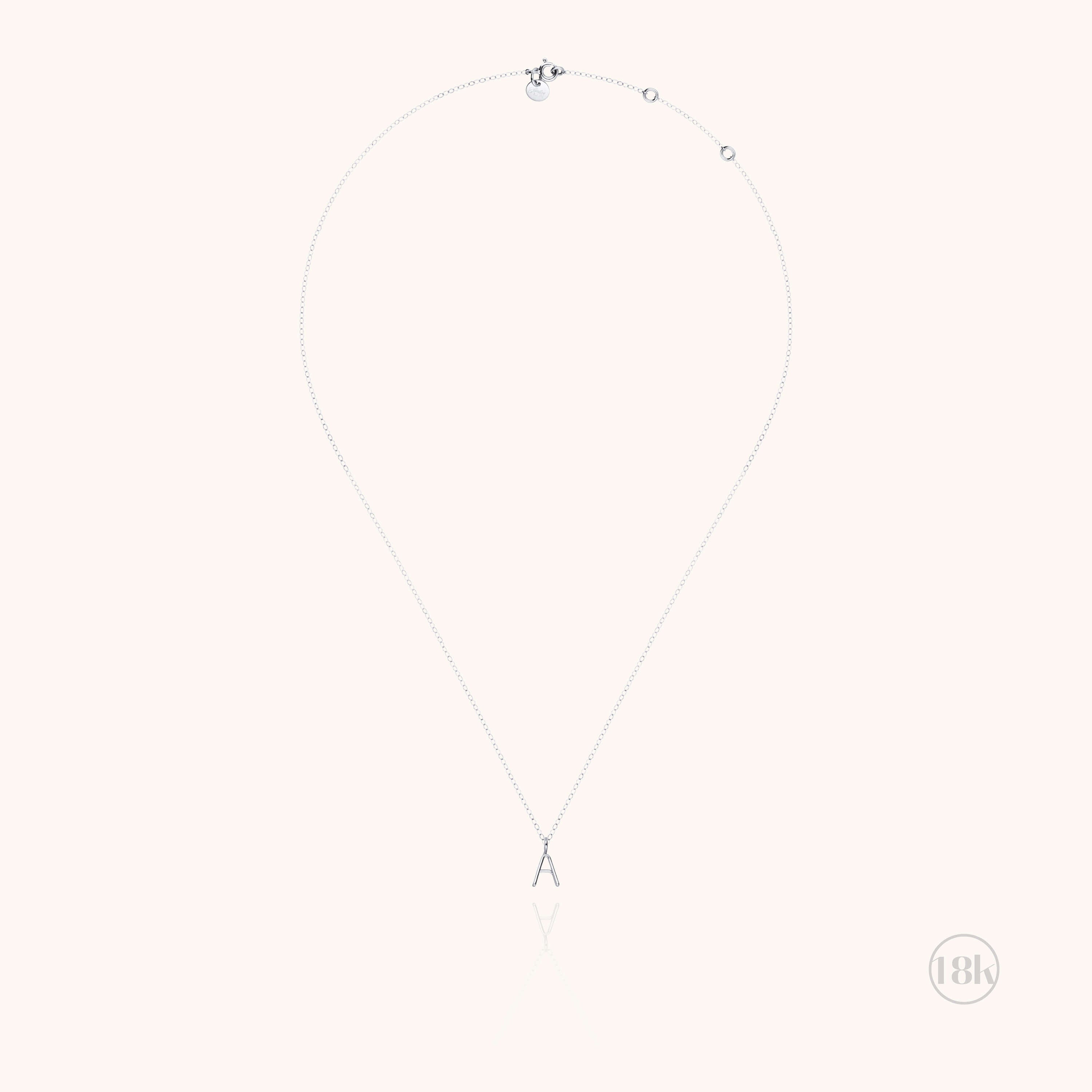 Collana Maiuscola Iniziale - oro bianco 18kt.