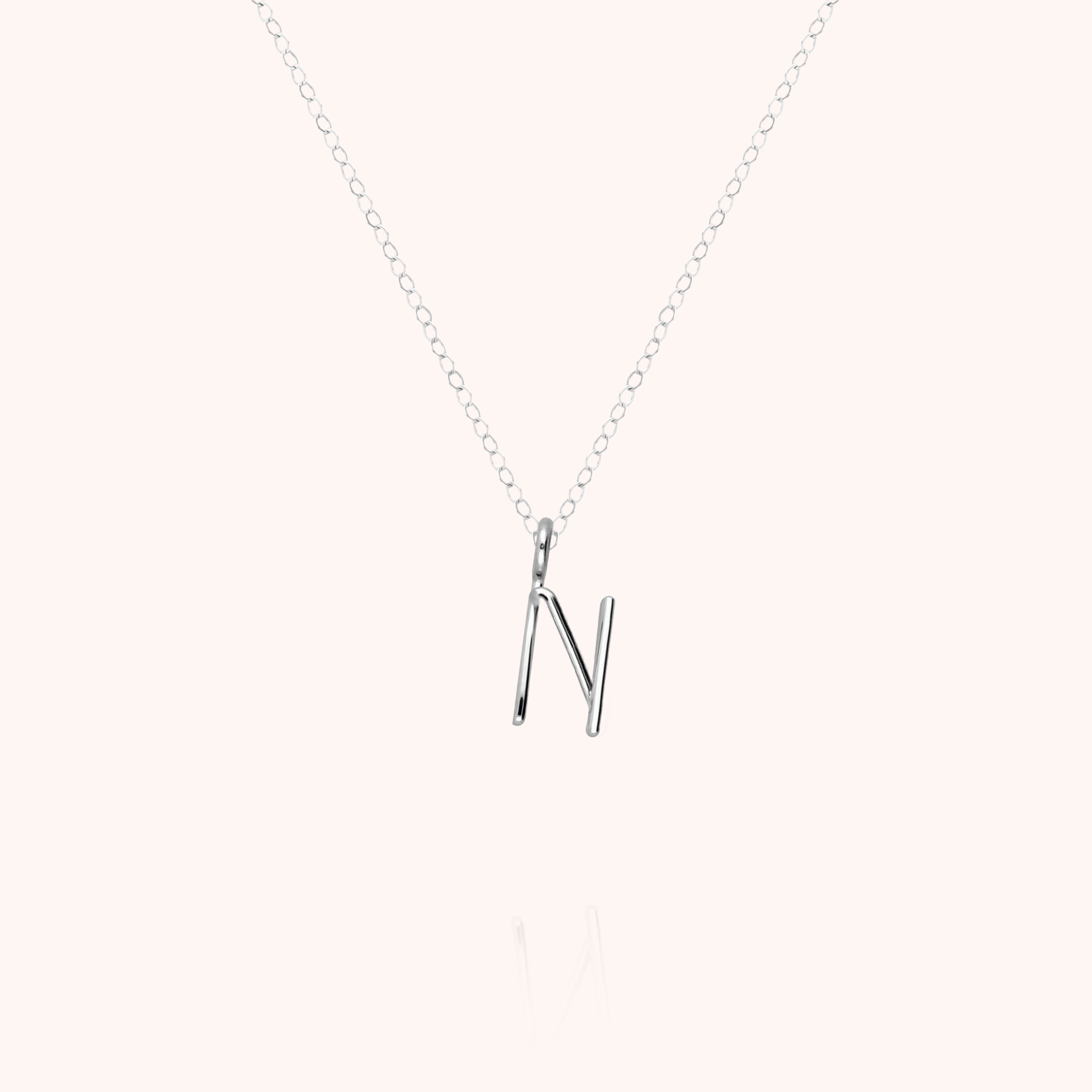 Collier Capital Initiale en or blanc 18K — expédition sécurisée Paris
