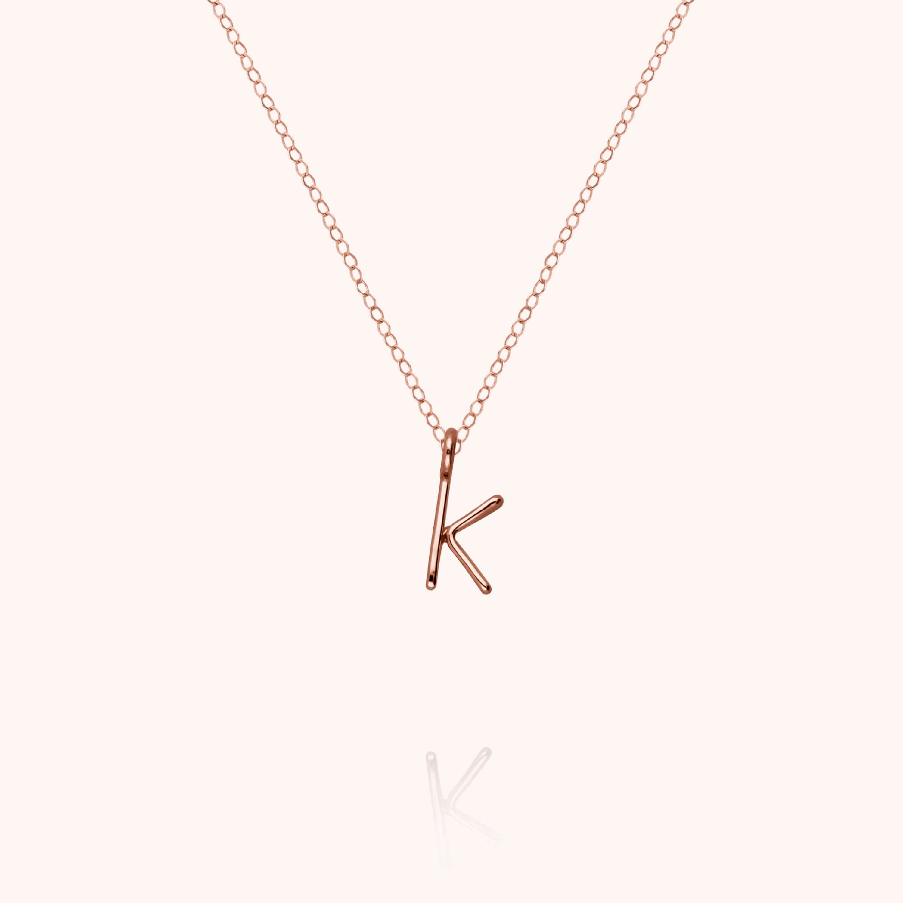Collier Capital Initiale en or rose 18K — expédition sécurisée Paris