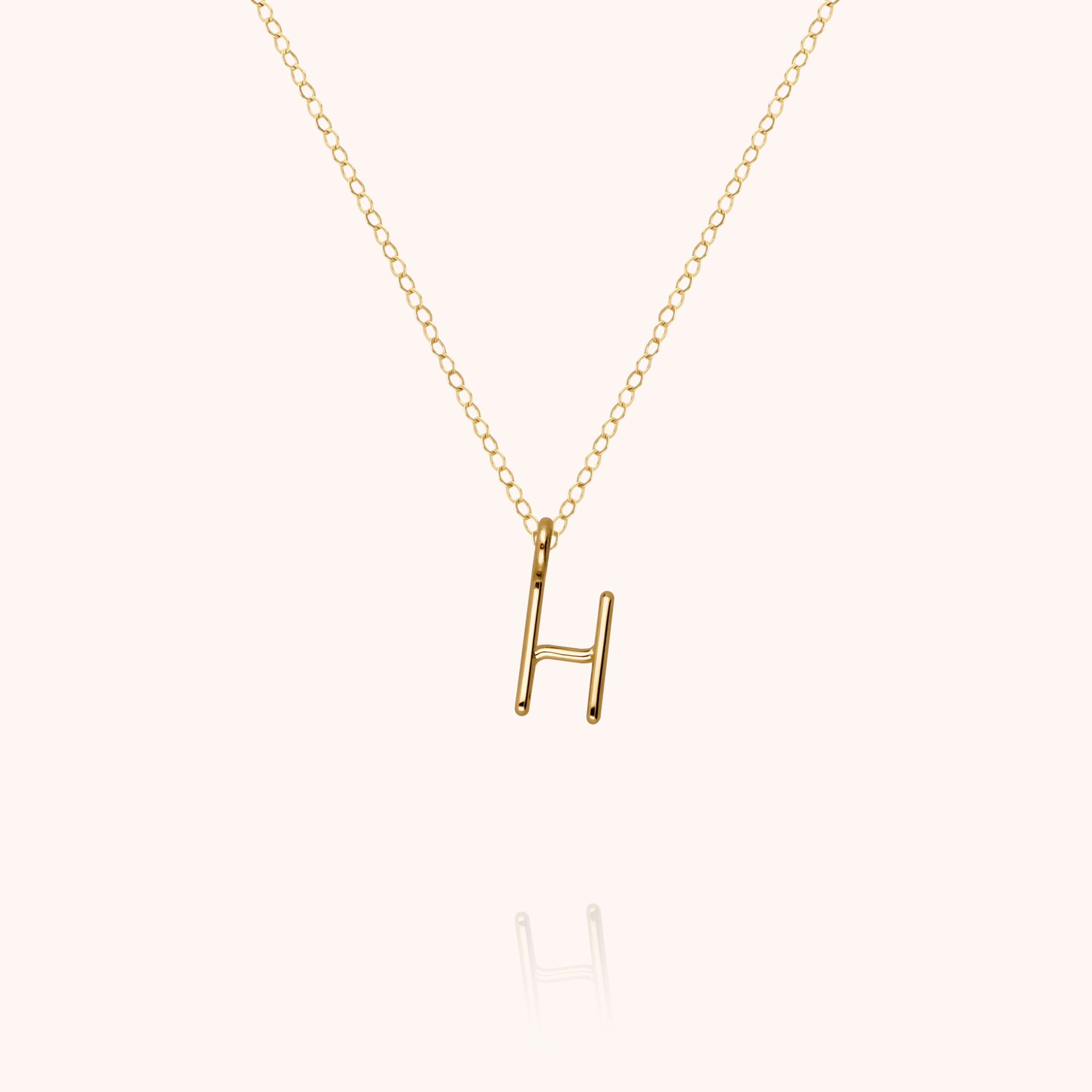 Collier Capital Initiale en or jaune 18K — collier personnalisable Atelier Paulin