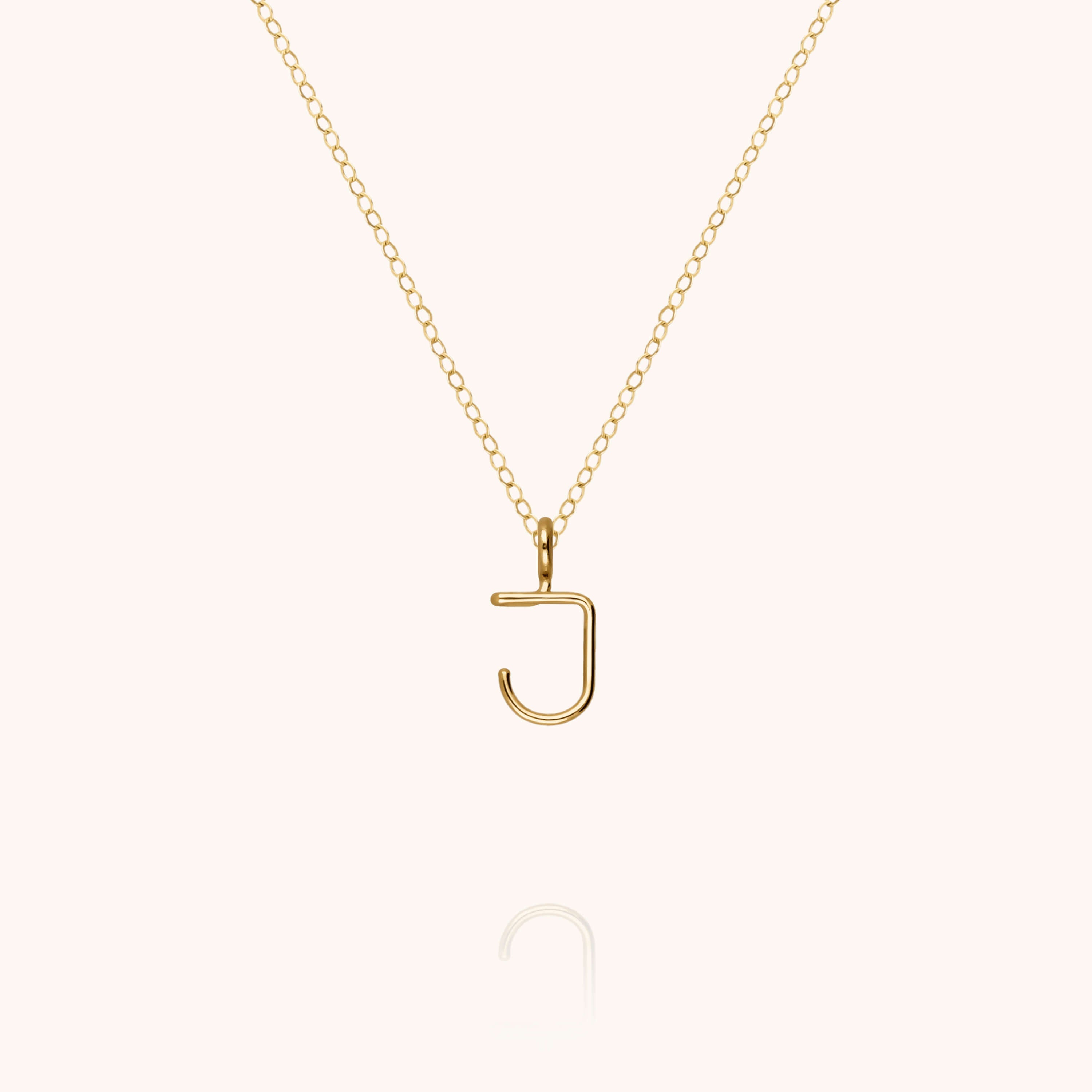 Collier Capital Initiale en or jaune 18K — expédition sécurisée Paris