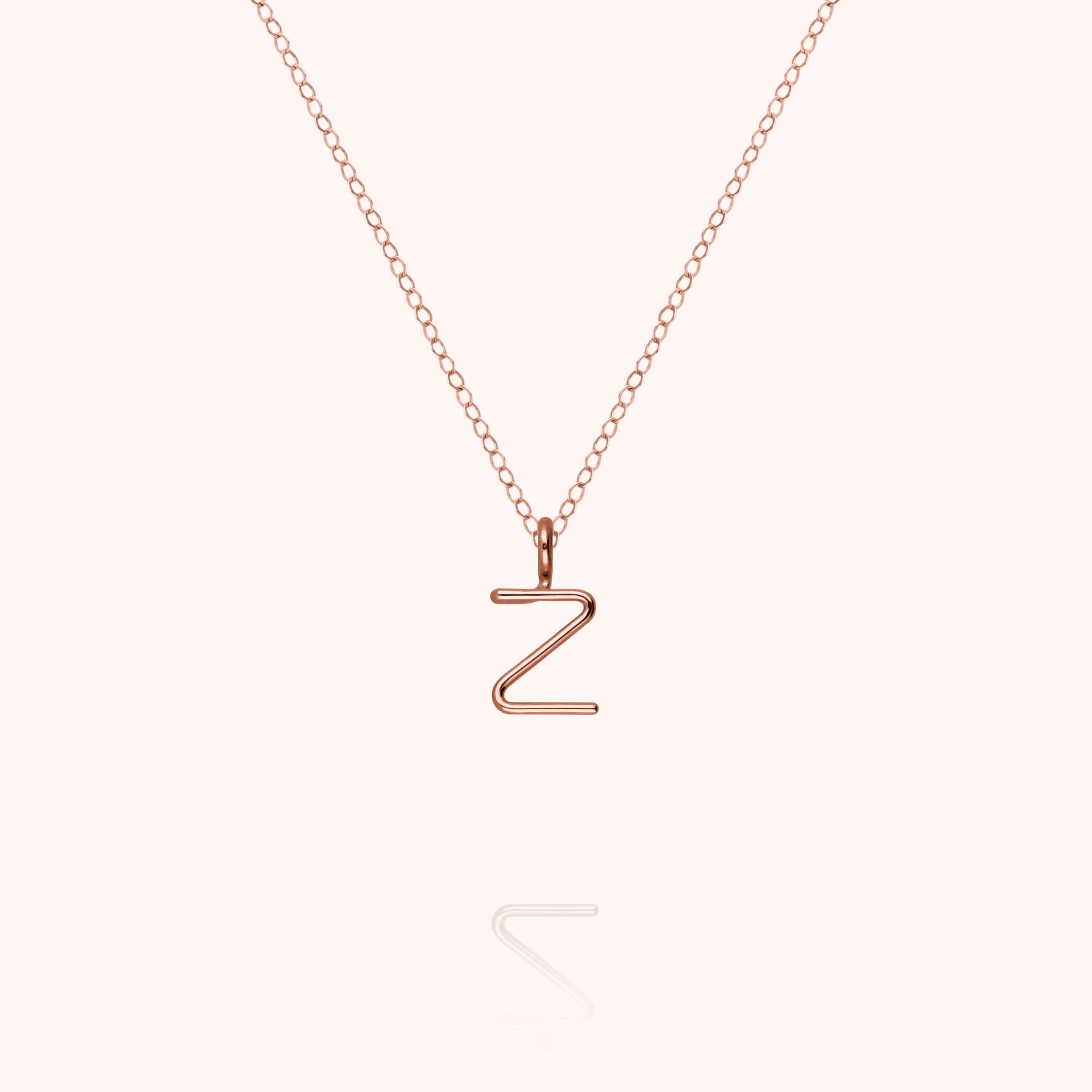 Collier Capital Initiale en or rose 18K — expédition sécurisée Paris
